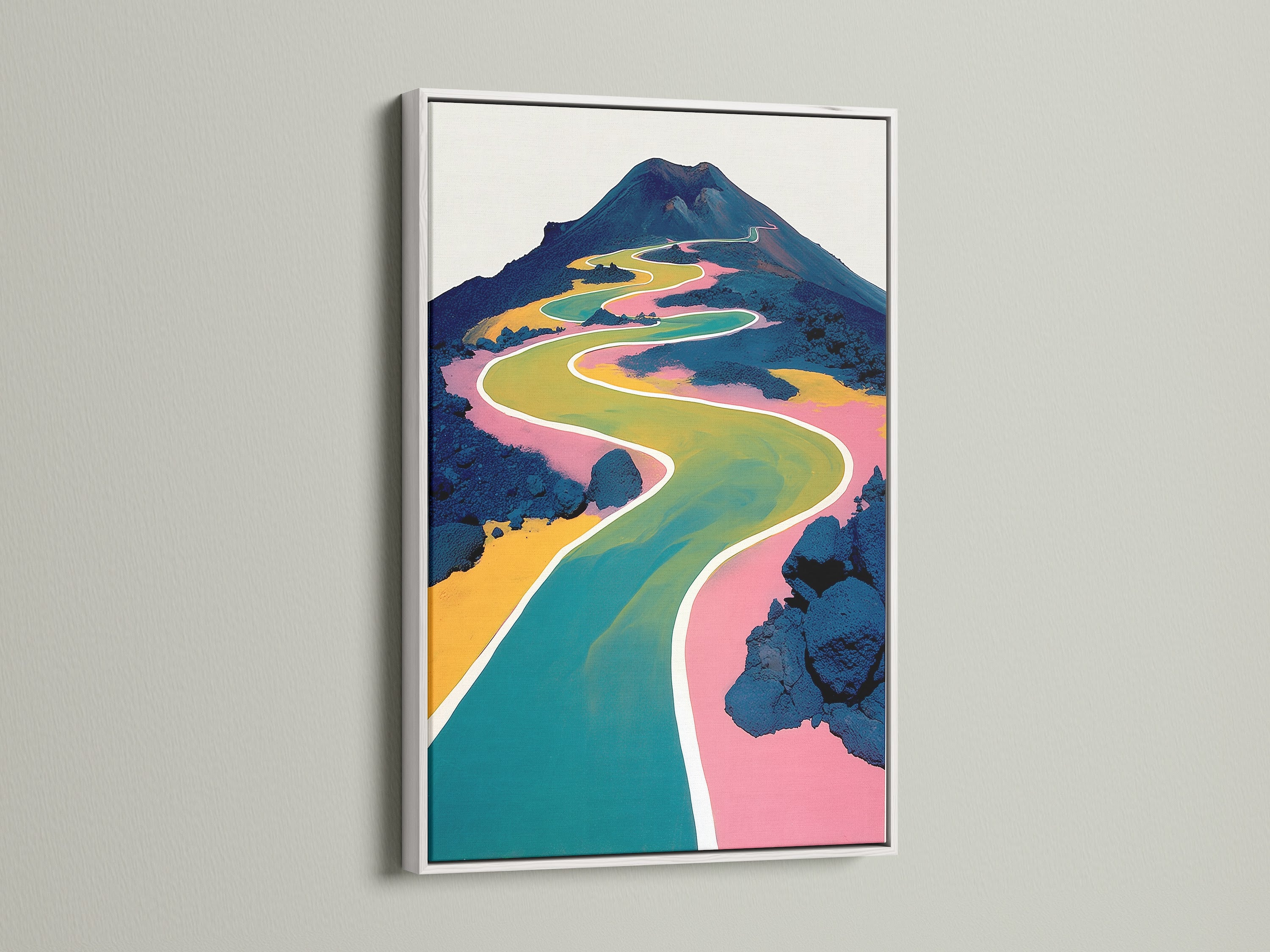 Modern abstract mountain artwork with a white frame. The canvas art features a colorful winding path. This contemporary art is perfect for adding a touch of modern nature to your space.