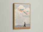 A surreal Fish Kite art print gleams in a gold frame. This dreamlike print enhances bohemian and eclectic spaces. The whimsical artwork brings fantasy wall art to life. Pastel colors add a unique touch. It is perfect for art collectors seeking imaginative art. This piece is ideal for living rooms and bedrooms.