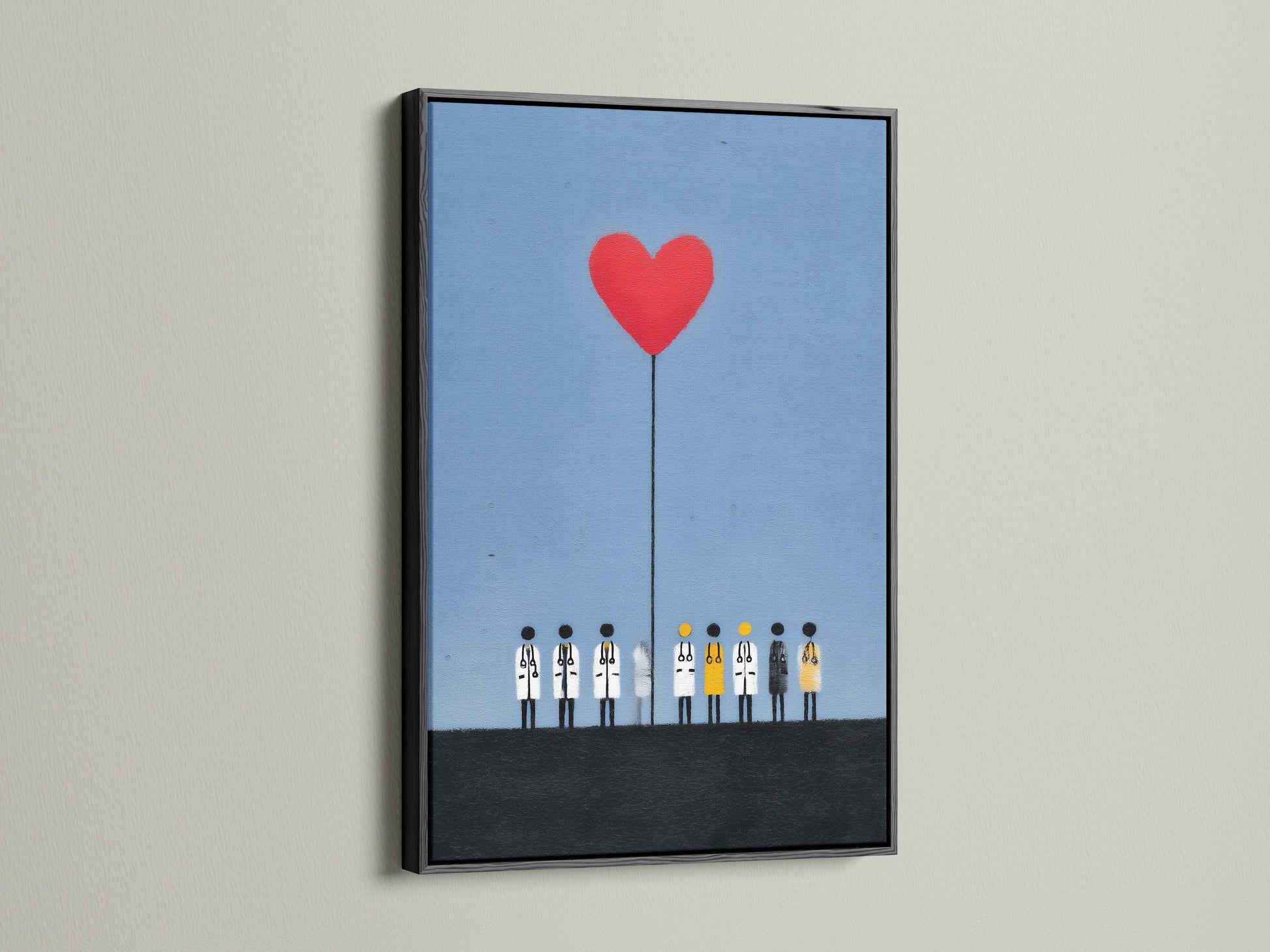 A modern artwork showing medical staff with a red heart balloon. The print is set in a black frame. The black frame adds a bold touch. Perfect as medical wall art or doctor office decor. This artwork celebrates healthcare professionals.