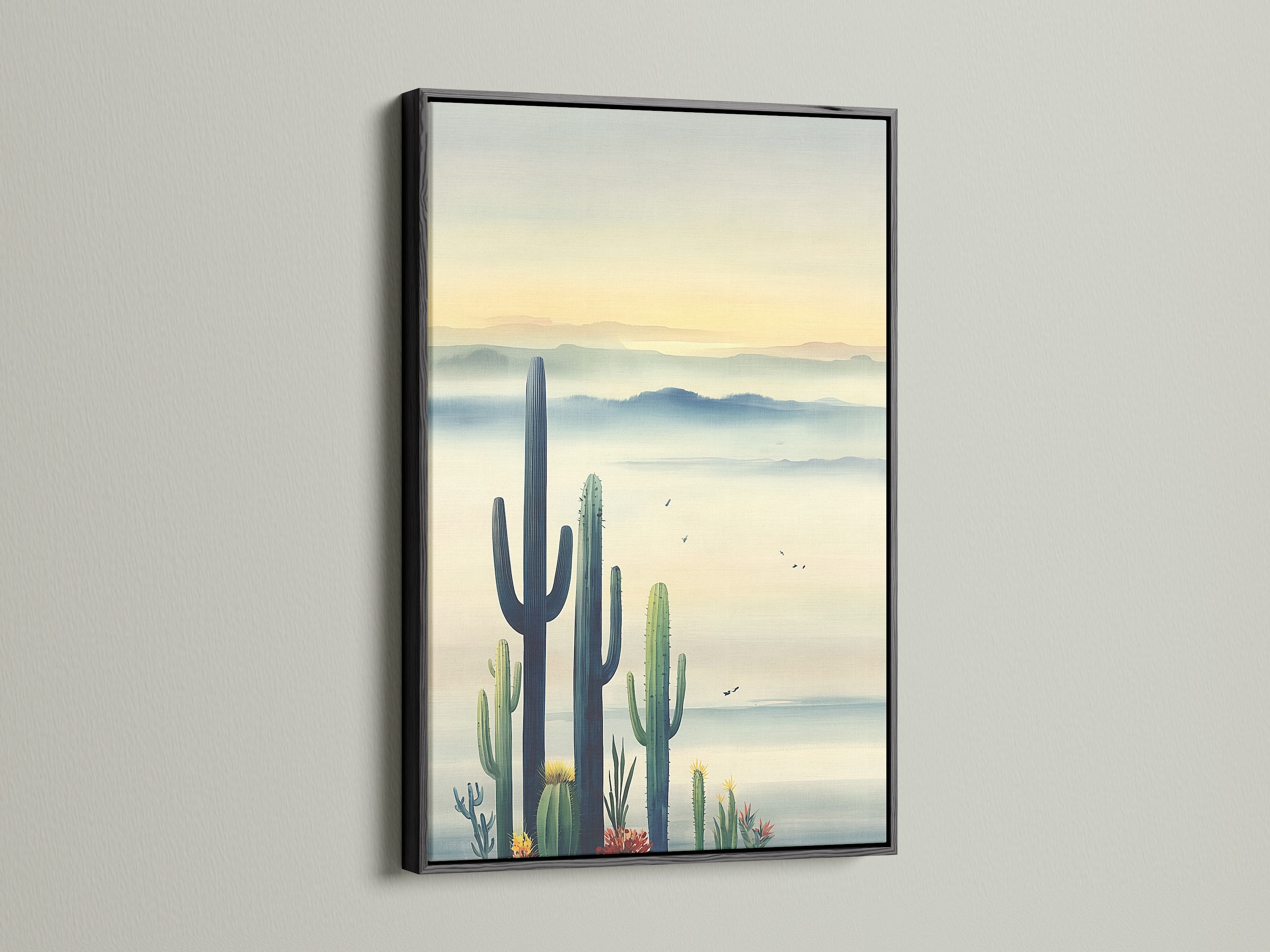 Cactus art in a black frame. This desert canvas adds a sophisticated touch to your space. The southwest decor enhances your home. It is a striking landscape print. The blue haze artwork brings a modern feel.