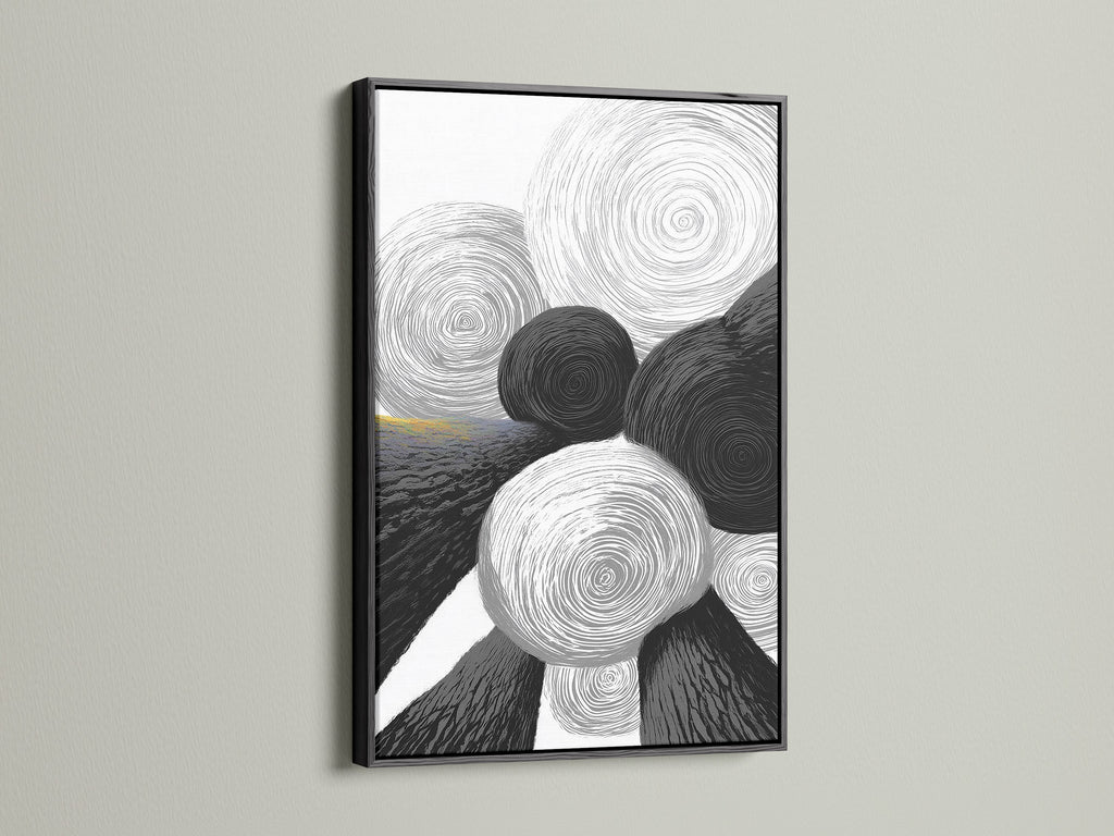 This geometric abstract art print features black and white circles. The art is encased in a sleek black frame. The contrast enhances the modern feel. Ideal for adding a sophisticated touch to your office or living space. This is contemporary art at its finest.
