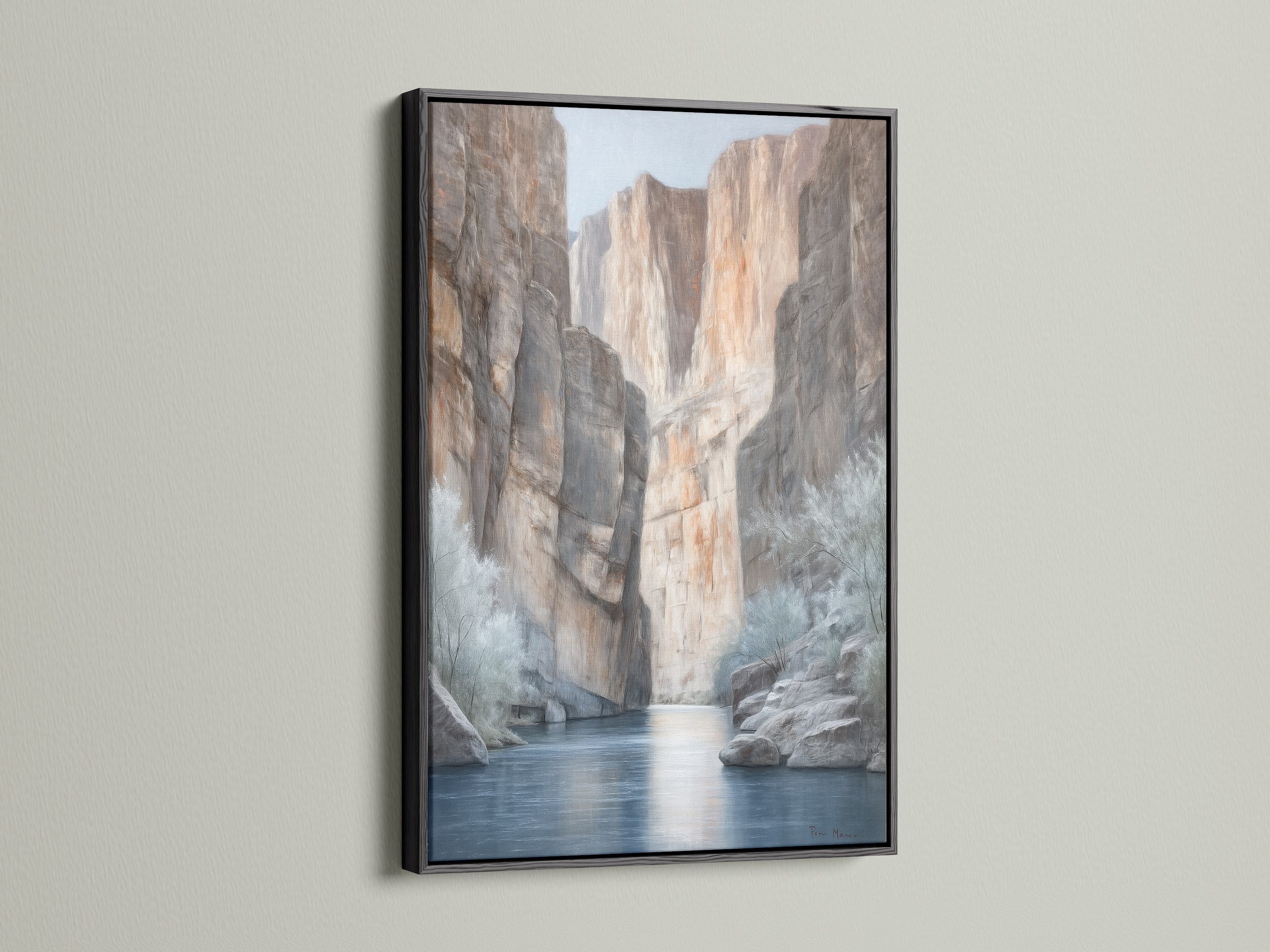 Canyon River canvas print in a bold black frame. This desert landscape artwork adds a modern touch to any room. The black frame makes the neutral tones pop. Ideal for Southwestern-inspired spaces. The river canvas print brings the beauty of nature indoors. Discover earth tone art for your home.