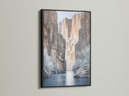 Canyon River canvas print in a bold black frame. This desert landscape artwork adds a modern touch to any room. The black frame makes the neutral tones pop. Ideal for Southwestern-inspired spaces. The river canvas print brings the beauty of nature indoors. Discover earth tone art for your home.