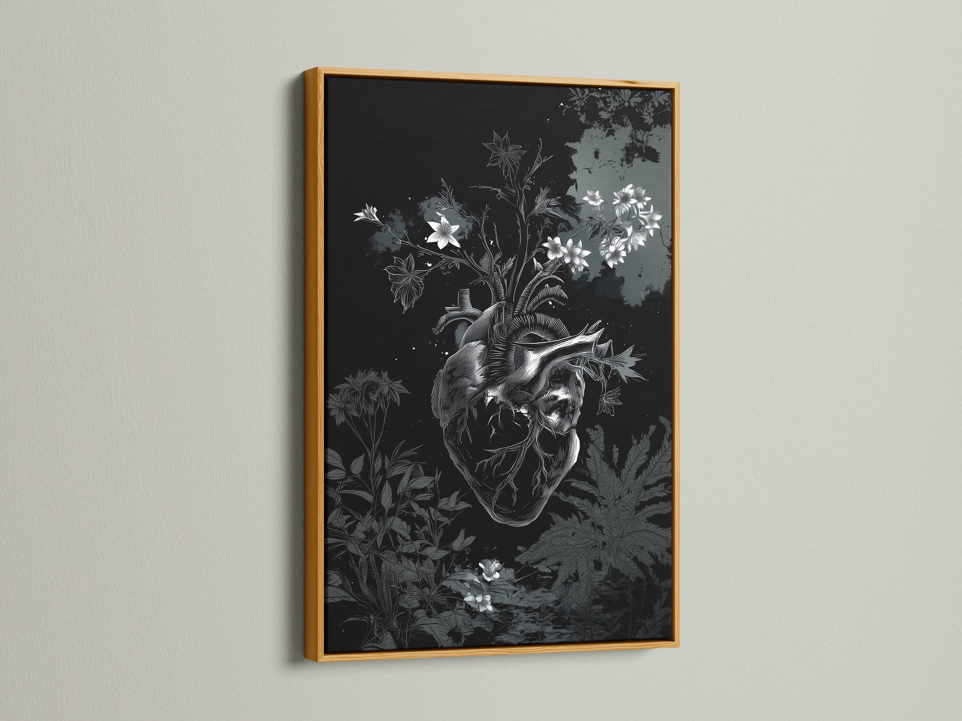 A botanical heart art print showcased in a gold frame. The gold frame adds a touch of elegance and luxury. The artwork is enhanced by the warm tone of the gold. It brings a touch of glamour to any room.