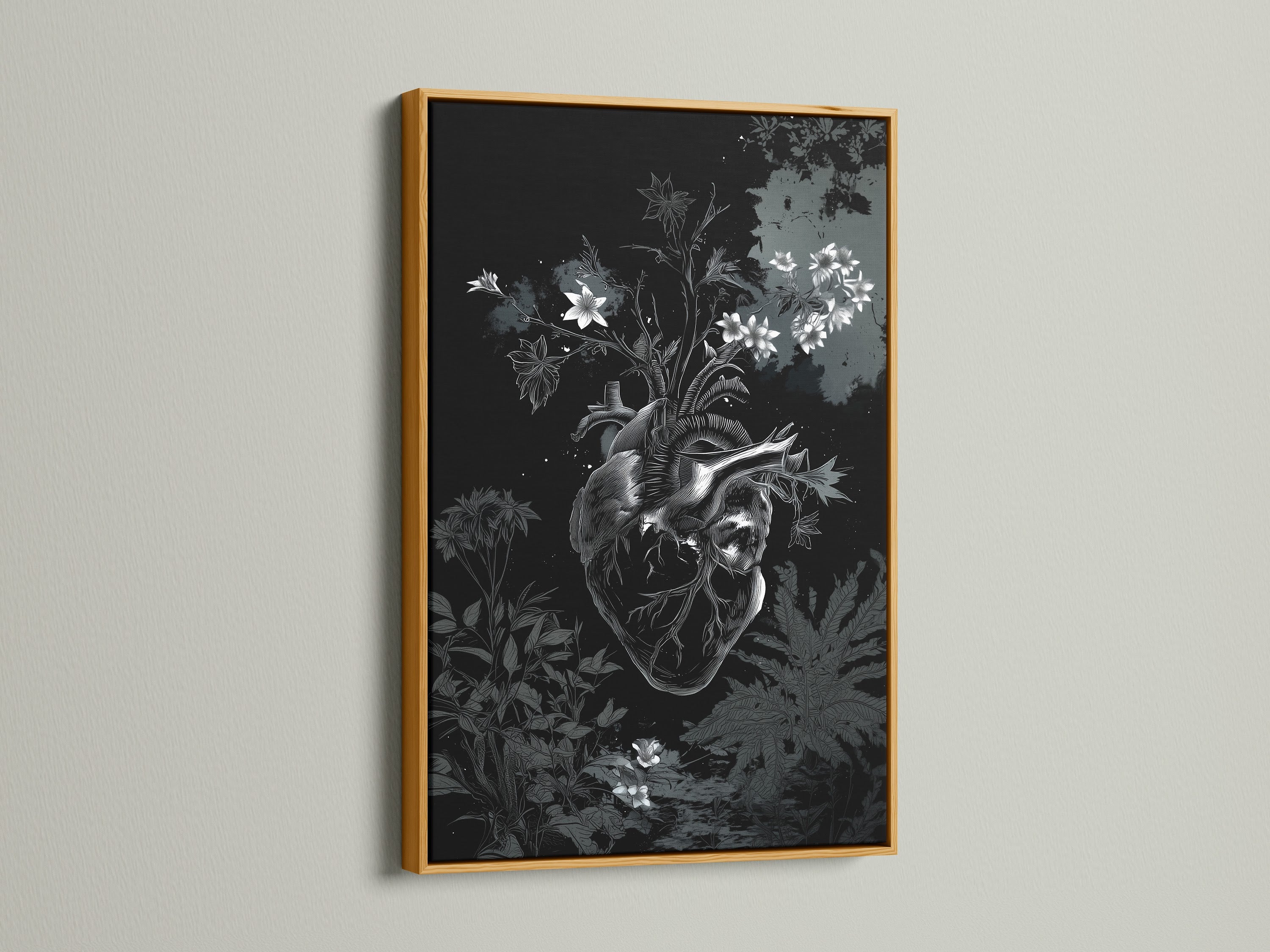 A botanical heart art print showcased in a gold frame. The gold frame adds a touch of elegance and luxury. The artwork is enhanced by the warm tone of the gold. It brings a touch of glamour to any room.