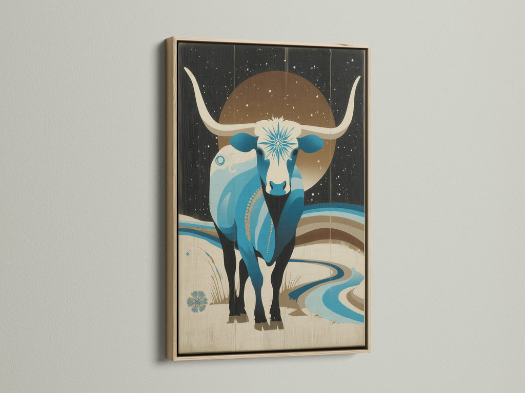 A framed Celestial Bull artwork with an oak frame. The blue bull canvas art is a stunning piece. This Western wall decor will elevate any space. It makes great living room wall art. Perfect for modern farmhouse style.