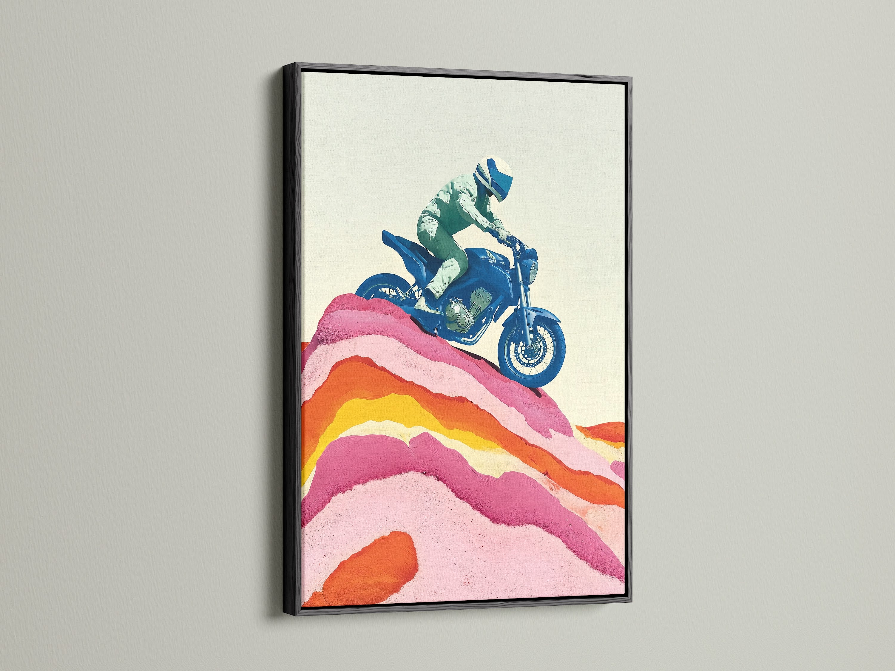 Retro biker artwork with a sleek black frame. This vintage motorbike canvas print is ideal for man caves and garage wall art. The artwork features a blue motorcycle and pink accents. A cool masculine touch.