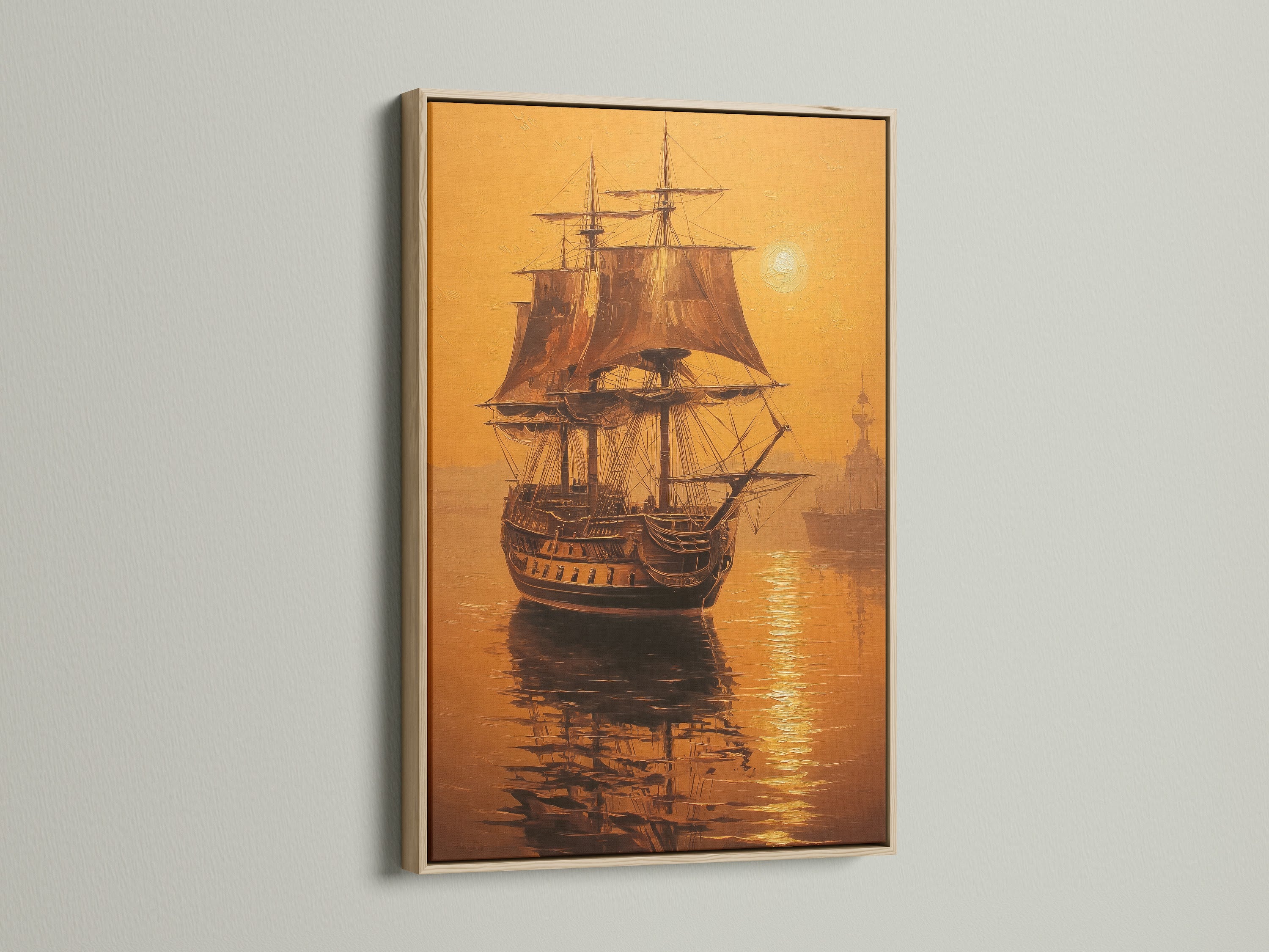 Artwork of a sailing ship in an oak floating frame. The artwork is a beautiful depiction of a ship sailing. The oak frame adds a touch of warmth and sophistication to the piece. Perfect for adding a touch of nautical charm to any room. The artwork is sure to be a conversation starter for your guests.