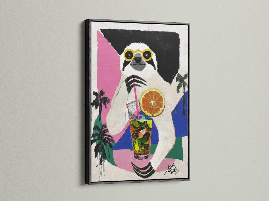 Sloth Cocktail artwork in a black frame. This tropical animal art is a bold statement piece. The black frame adds a modern touch. It is ideal for creating a focal point in your kitchen bar or living room.