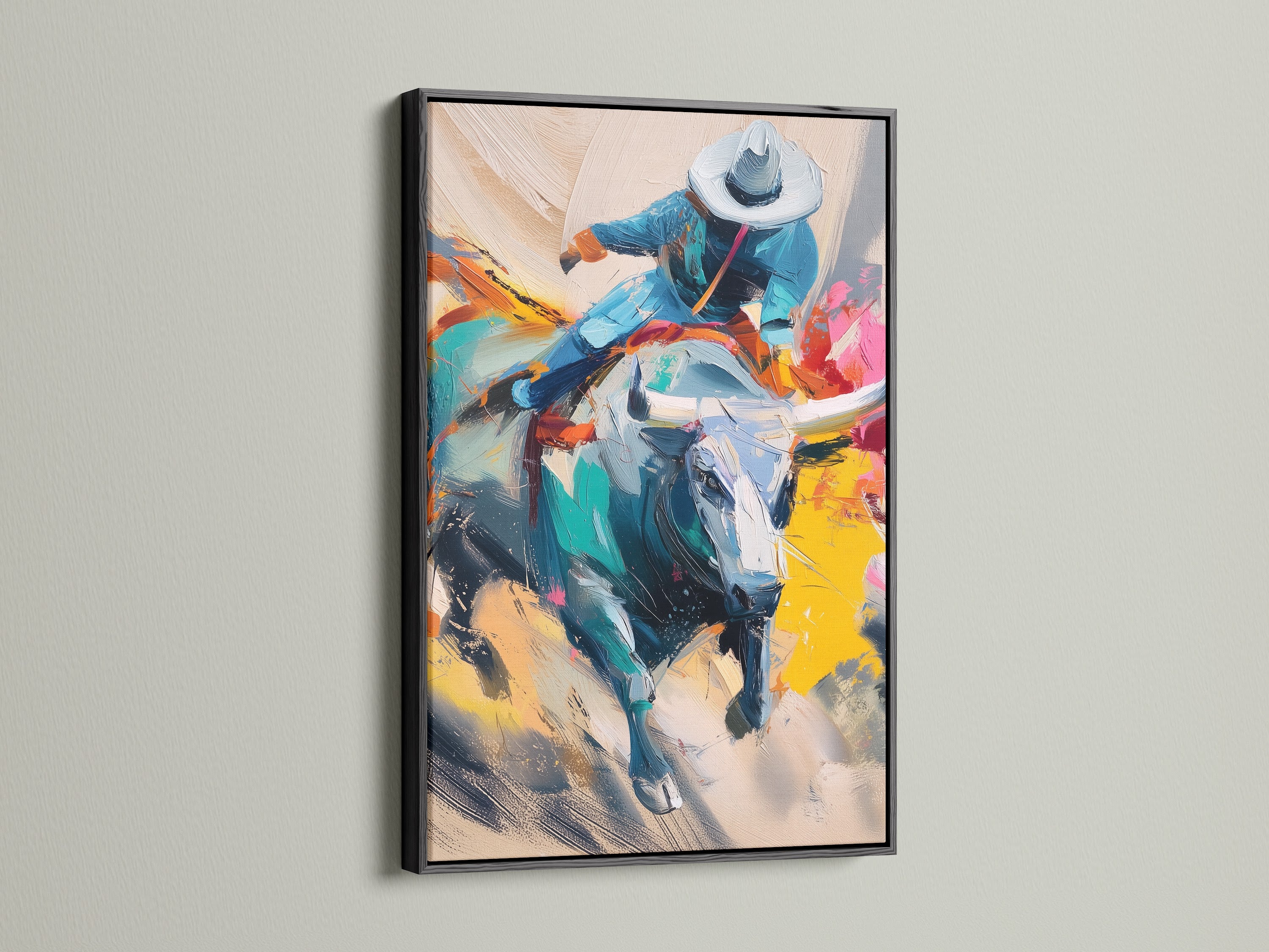 Add a touch of sophistication with cowboy rodeo canvas art in a black frame. This western art print features a bull rider. Complements western home decor. Perfect for a man cave or office.