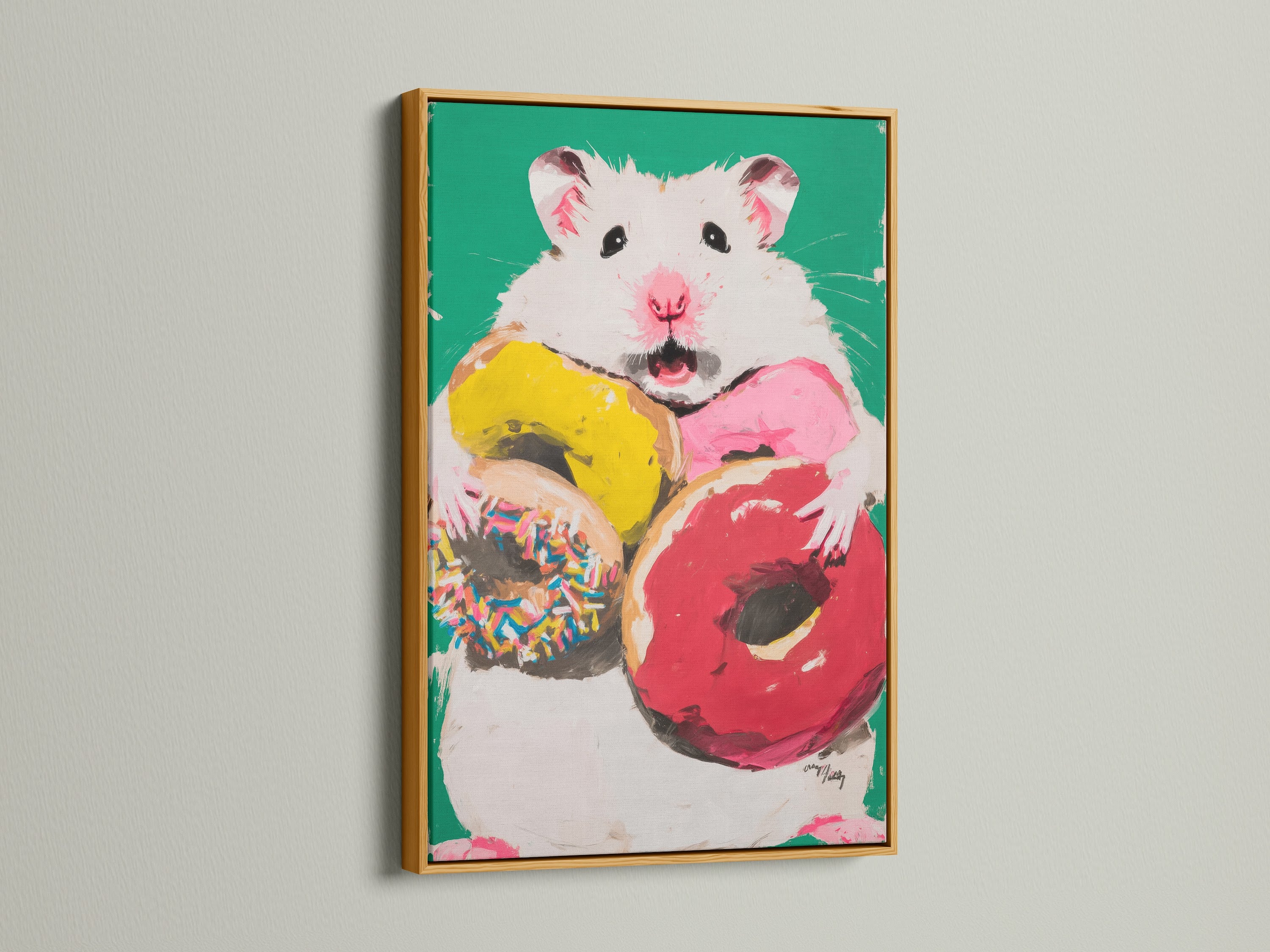 A gold frame adds a touch of elegance to this hamster donut artwork. It's a playful addition to any room. This colorful canvas art is perfect for nursery wall art. It's a charming pet portrait art piece.