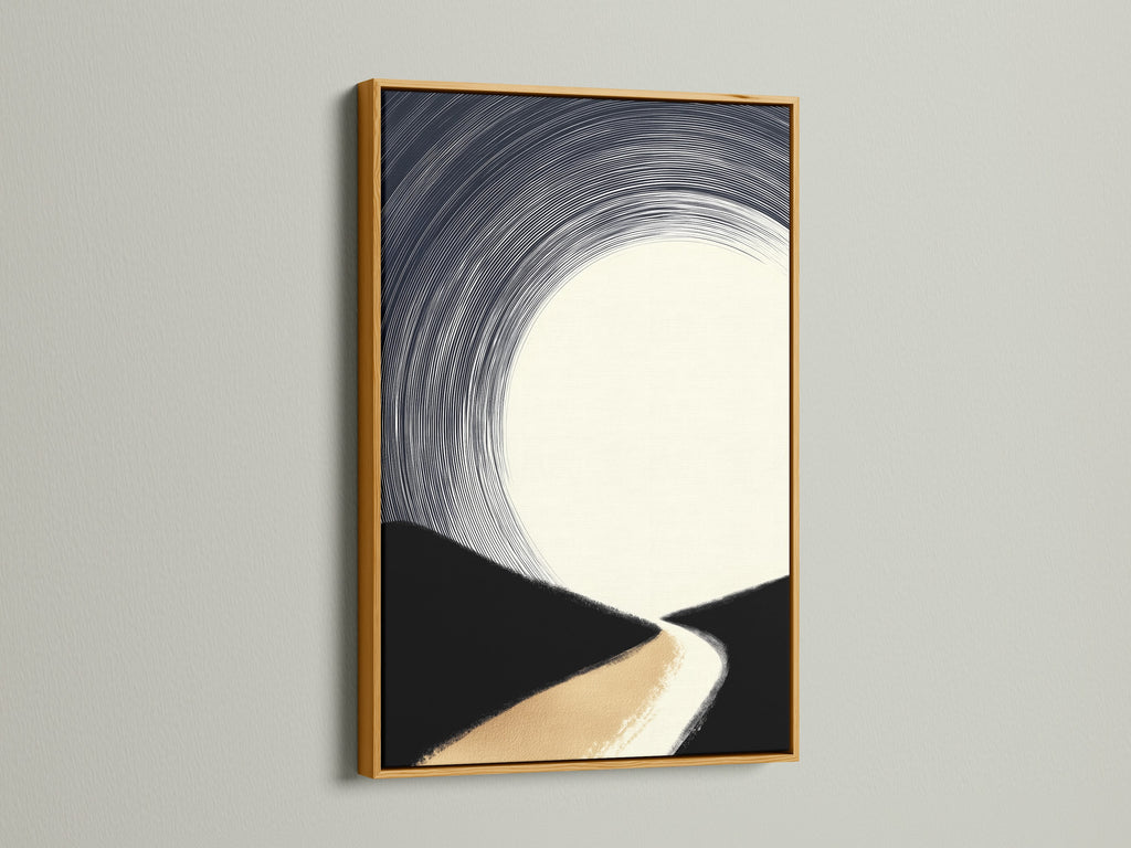 A gold frame highlights a minimalist piece of art. The artwork presents an abstract landscape. The colors are beige black and white. This frame and artwork combo adds a touch of luxury. Perfect for enhancing living rooms bedrooms and offices with modern elegance.