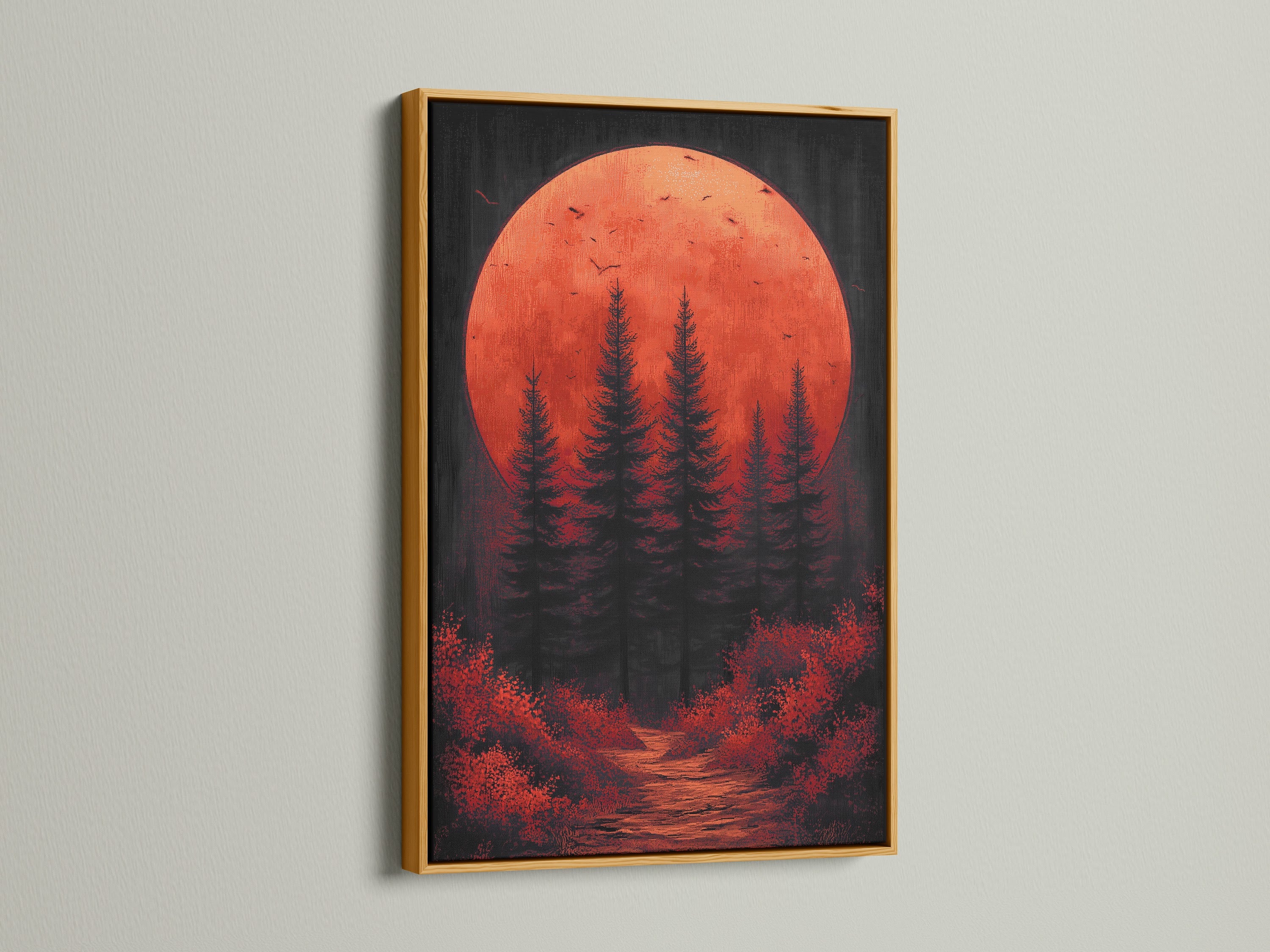 A stunning gold frame showcases the forest moon canvas print. The red orange decor and moody landscape provide a mystical touch. This sunset wall art is ideal for enhancing bedroom accents or studio decor. The gold frame adds elegance.