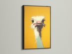 An ostrich art print is elegantly showcased in a black frame. The black frame provides a bold and sophisticated touch. It makes the colors of the artwork pop. Enhance your home with framed art prints.