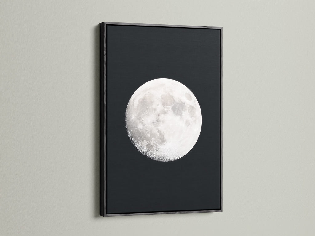 Full Moon lunar phase artwork with a black frame. This celestial wall art enhances bedroom astronomy decor. A unique moon phase art piece. This artwork brings space themed art to modern living. It makes a thoughtful astrology gift. This is a stunning night sky print. This is a full moon artwork for celestial print collections.