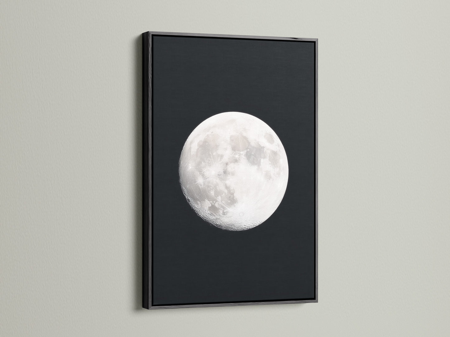 Full Moon lunar phase artwork with a black frame. This celestial wall art enhances bedroom astronomy decor. A unique moon phase art piece. This artwork brings space themed art to modern living. It makes a thoughtful astrology gift. This is a stunning night sky print. This is a full moon artwork for celestial print collections.