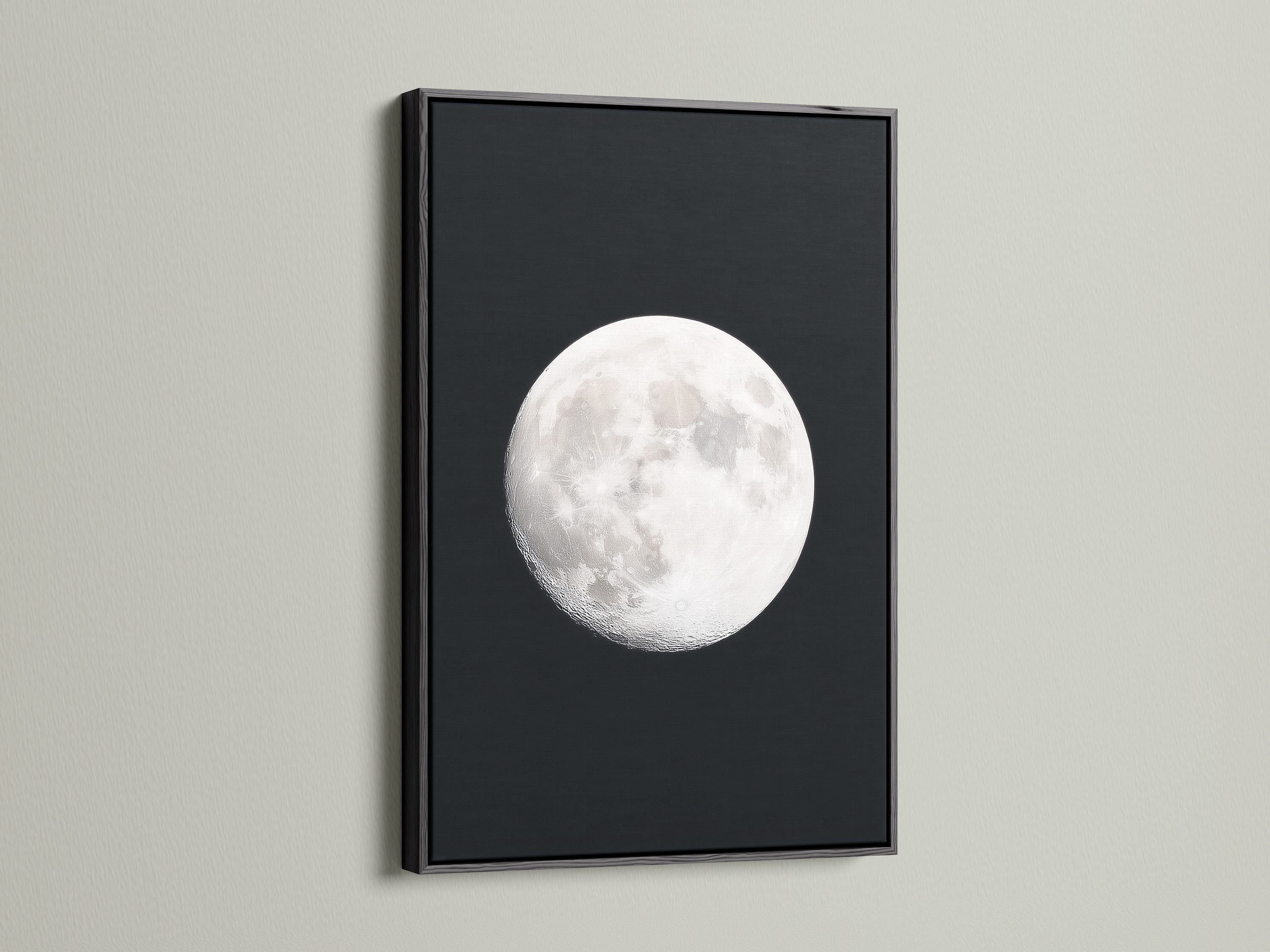 Full Moon lunar phase artwork with a black frame. This celestial wall art enhances bedroom astronomy decor. A unique moon phase art piece. This artwork brings space themed art to modern living. It makes a thoughtful astrology gift. This is a stunning night sky print. This is a full moon artwork for celestial print collections.