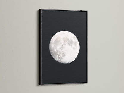 Full Moon lunar phase artwork with a black frame. This celestial wall art enhances bedroom astronomy decor. A unique moon phase art piece. This artwork brings space themed art to modern living. It makes a thoughtful astrology gift. This is a stunning night sky print. This is a full moon artwork for celestial print collections.