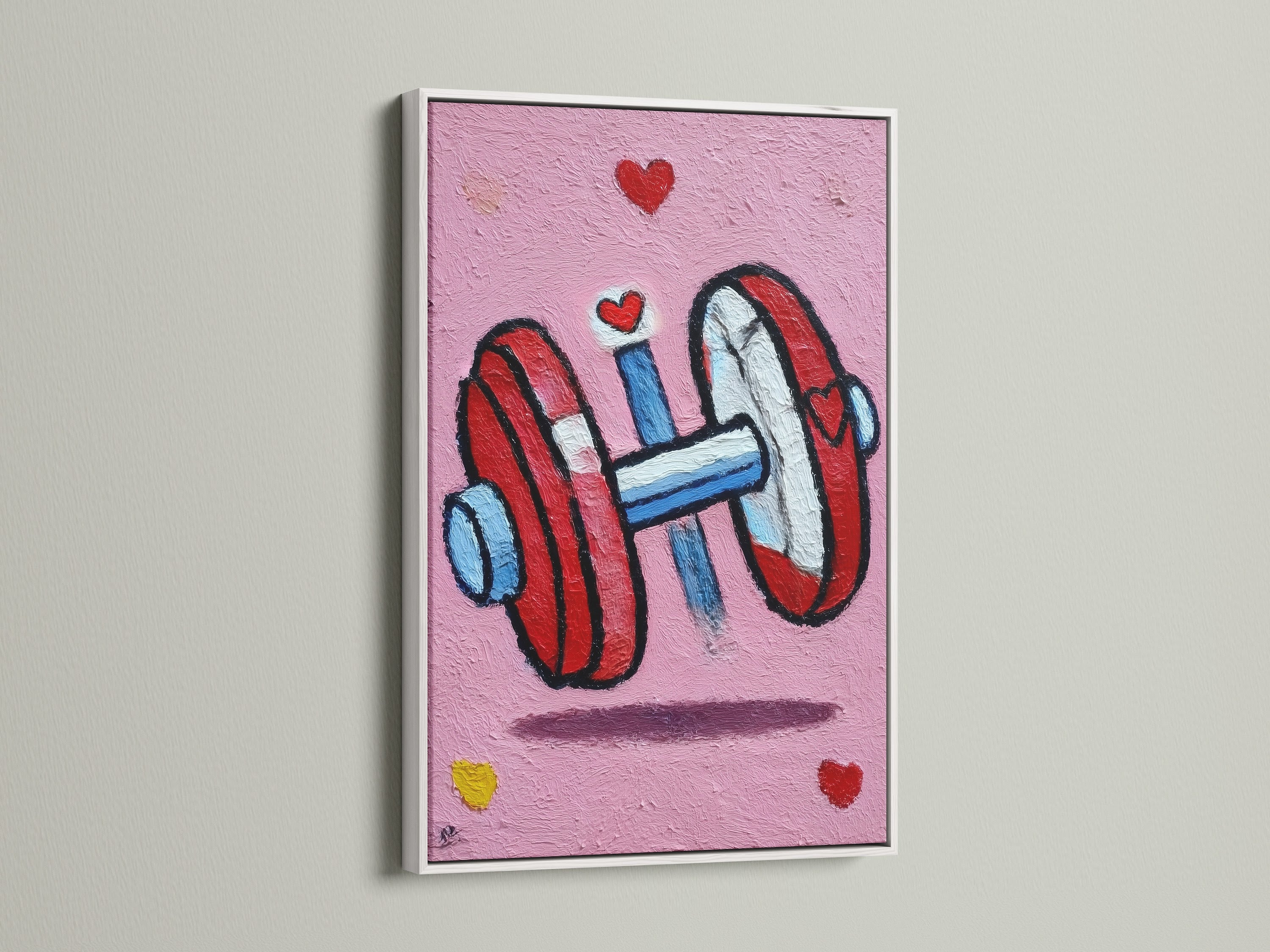 Dumbbell art print displayed in a white frame. A pink gym canvas print adds a fresh touch. This fitness wall art will brighten any space. The white frame complements the artwork. Ideal for home gym decor. This artwork offers fitness motivation.