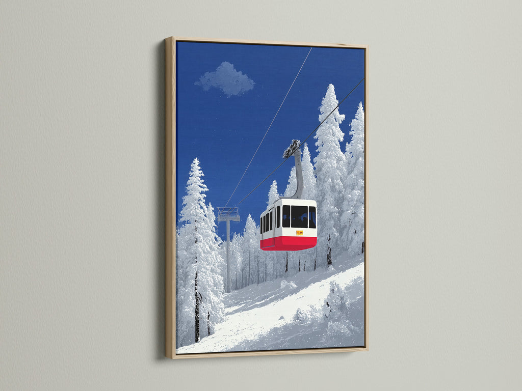 An oak frame enhances this ski lift art print. The winter mountain wall art features an alpine cable car. The artwork is set against a snowy landscape. This piece is perfect for cabin decor. It brings a lodge style to any room. The oak frame complements the blue and white primary colors.