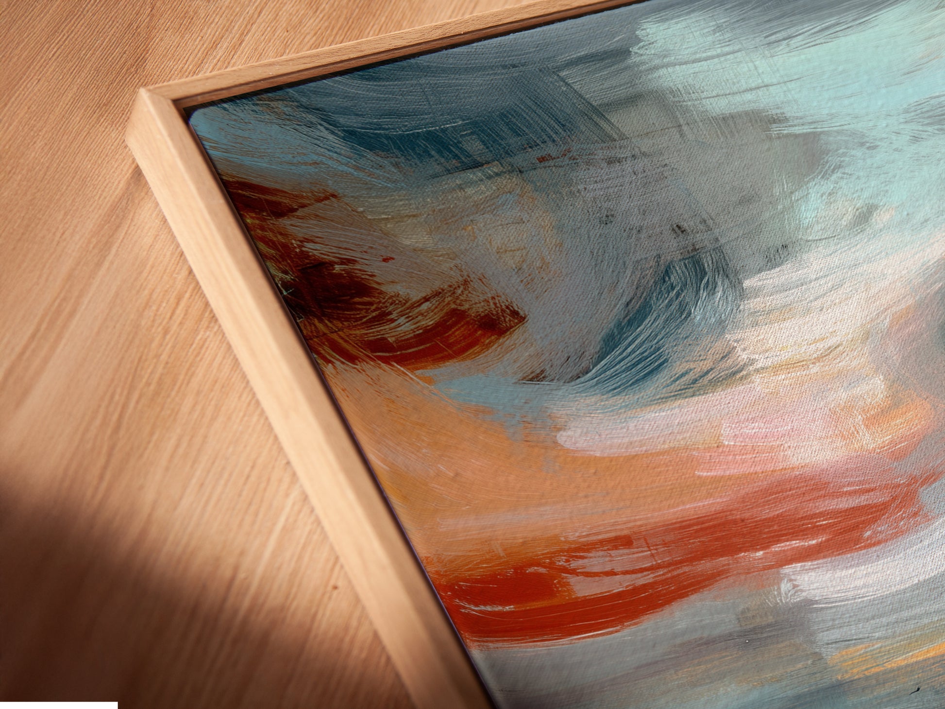 A close-up of a canvas print in a floating frame. This abstract aviation art features a stunning sunset reflection. The floating frame enhances the modern art. Add a touch of elegance to your office wall decor with this airplane art.