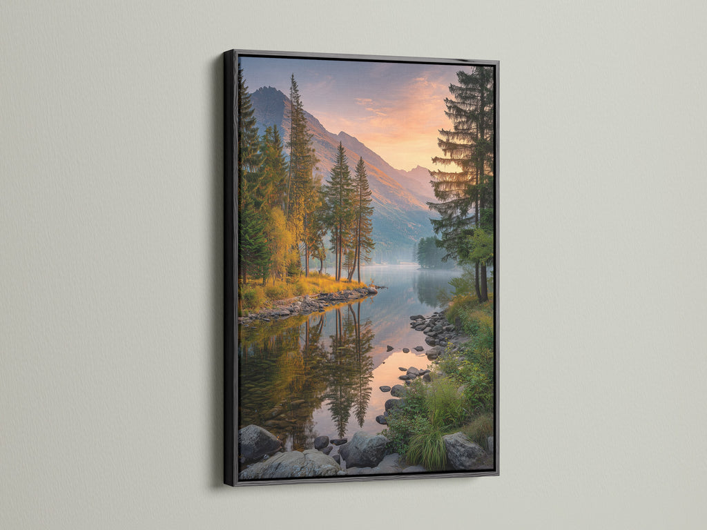 A black frame showcases a beautiful mountain lake canvas print. This landscape artwork captures the essence of nature. This pine tree art adds a touch of elegance to any room. Perfect for cabin wall art and nature lovers. Elevate your home decor with this striking nature canvas and scenic print.