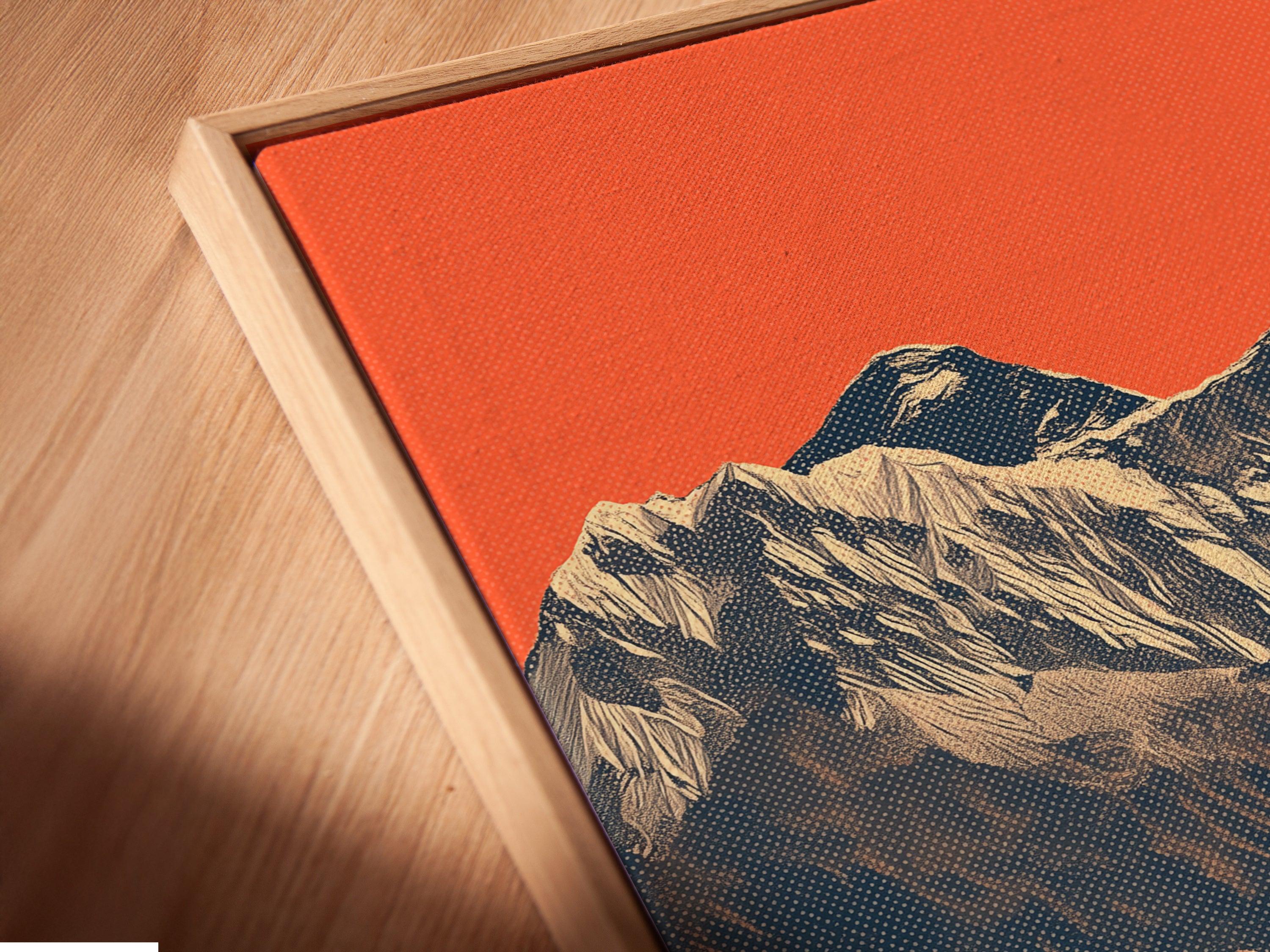 Close-up of a canvas print in a floating frame. The mountain artwork features a Himalayan landscape with peach and teal tones. This vintage poster is perfect for living rooms bedrooms offices or boardrooms.