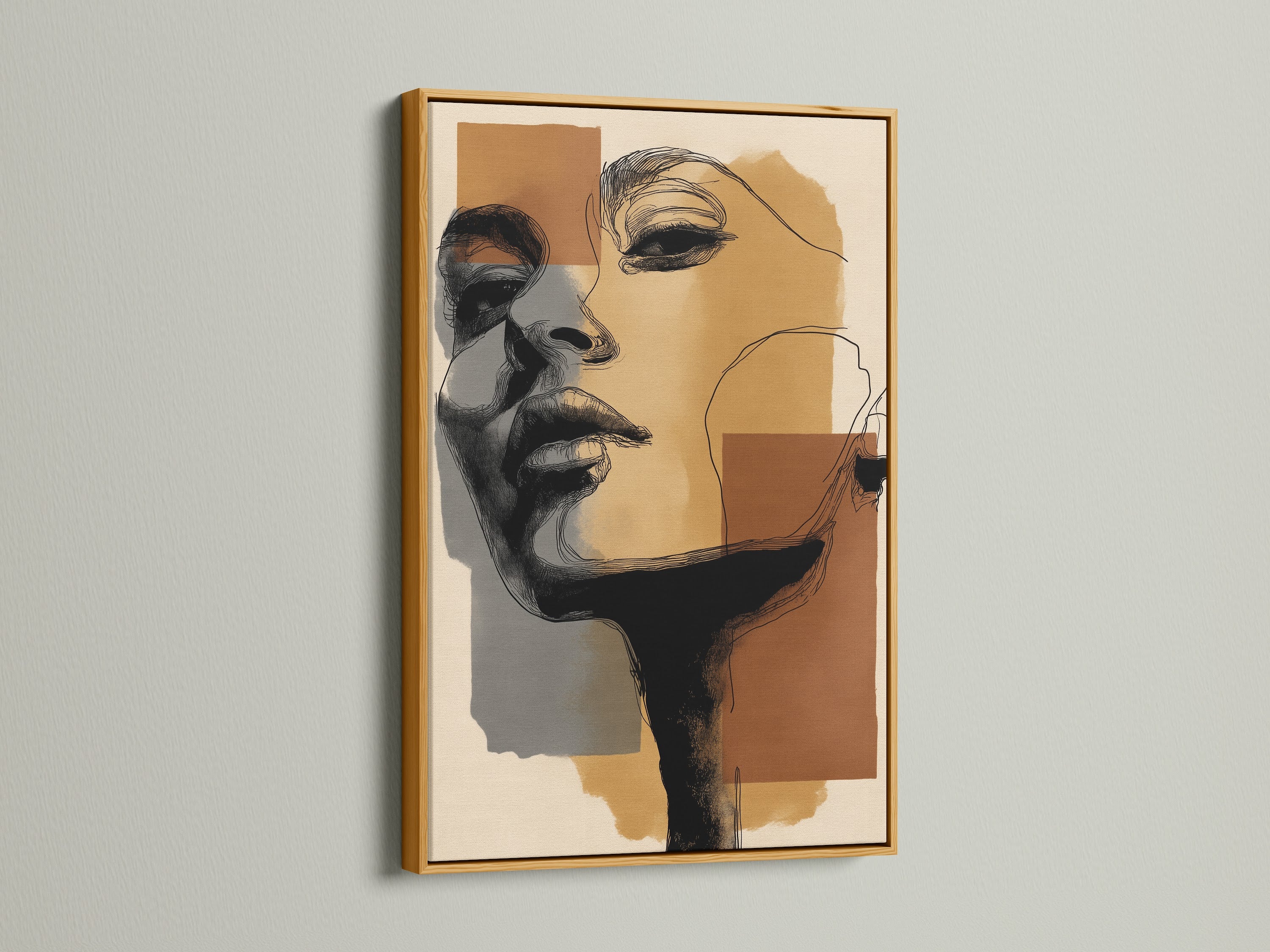 Gold frame highlighting an abstract portrait canvas print. This modern wall art elevates your interior design. The minimalist face drawing adds a touch of luxury. Perfect for living rooms or offices.