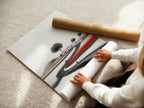 A woman is carefully rolling a fine art poster paper print of the Ink Wash Landscape. Ensuring the minimalist Asian-inspired artwork is pristine. Fine art poster paper showcases the details. Ideal for those who appreciate quality art prints. Perfect for framing.
