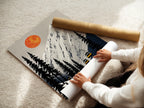 A woman rolling a fine art poster paper. This high quality paper ensures a pristine print. Perfect for the mountain ski lift artwork. Get ready to display your alpine landscape art. This poster paper is ideal for framing. You can enhance your cabin wall decor.