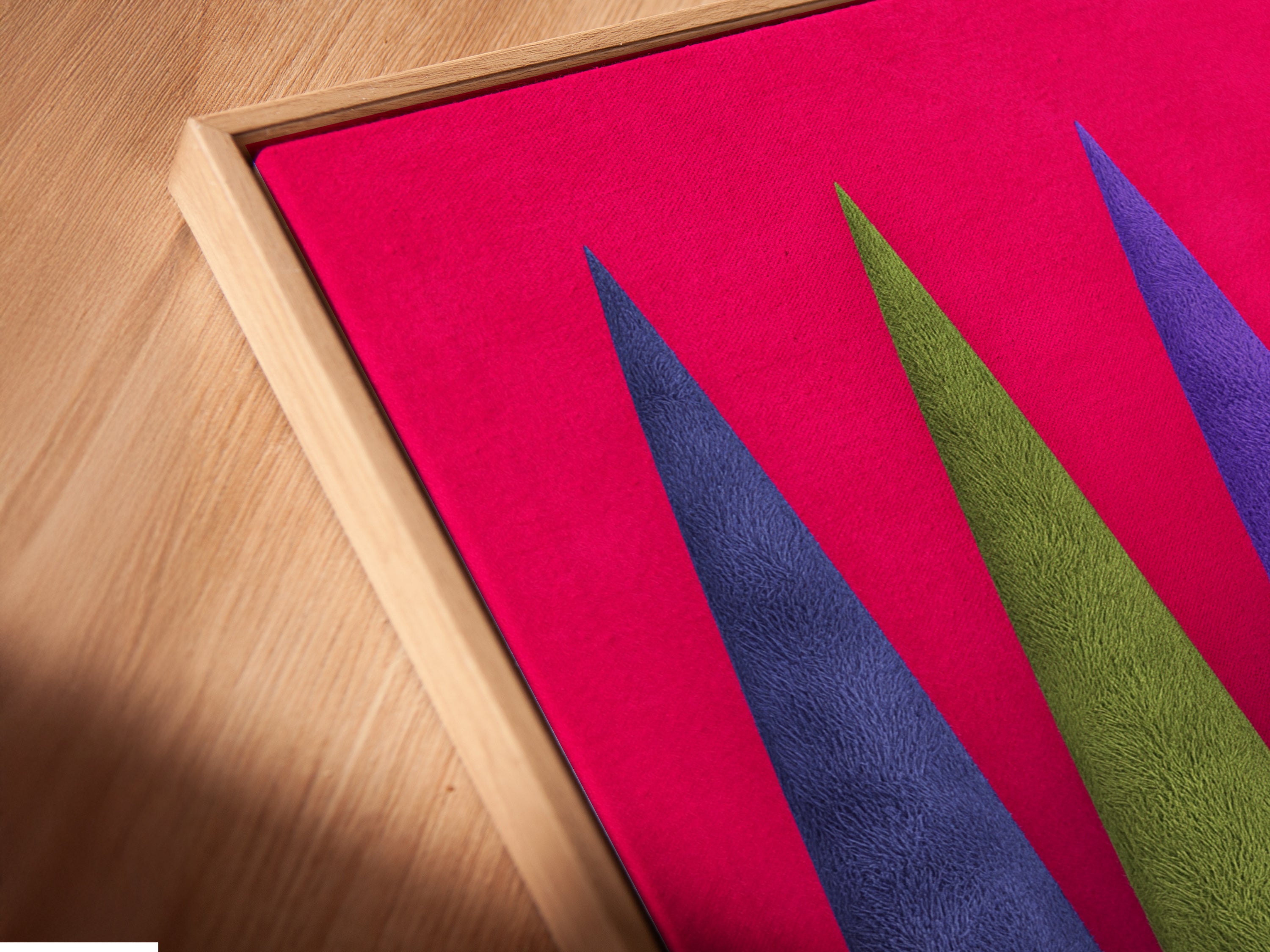 Angled close up of Cypress Tree artwork on canvas in a floating frame. This modern wall art is a colorful plant poster. This is perfect for adding a unique touch to your home office decor. Explore vibrant garden art.