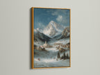 Alpine Village art print in a gold frame. The winter mountain landscape adds a touch of elegance. It is a perfect piece of mountain home decor. The snow scene print is great for creating a cozy atmosphere. The artwork has a lodge style.