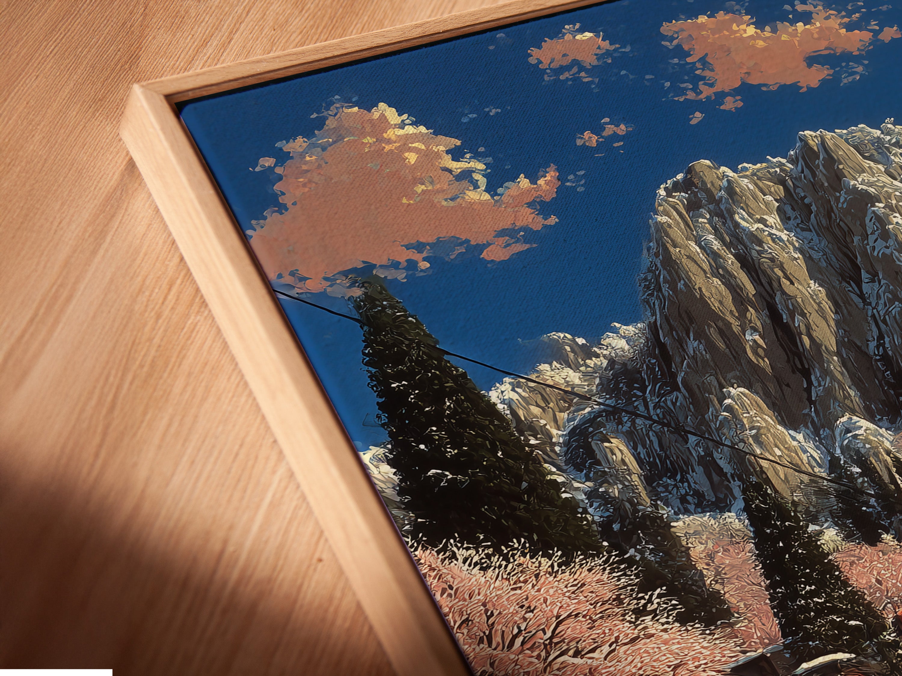 A close-up of a canvas print in a floating frame. The artwork is a vintage train in an alpine mountain landscape. The floating frame adds a modern touch. It is perfect for neutral wall decor.