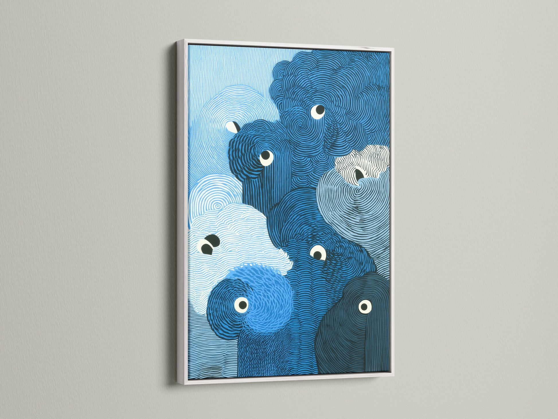 The abstract wave artwork is presented in a clean white frame. The art enhances the blue ocean print. The modern swirl art complements the light background. The piece adds a fresh and airy feel to your home. This is beautiful wall decor for any room.