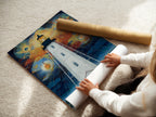 A woman is rolling a fine art poster paper. The paper features a lighthouse geometric sky print. This coastal artwork is perfect for nautical home decor. The fine art poster paper ensures high-quality reproduction. It is ideal for framing and displaying in any room.