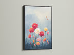 A floral garden artwork is displayed within a black frame. The artwork features colorful flowers like red white orange and pink. Botanical artwork adds a modern touch to any room. Perfect for bedrooms living rooms and more. The black frame adds a bold and sophisticated touch.