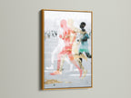 Abstract Runners Art Print with a gold frame. This contemporary canvas print elevates any living space. The abstract figures in motion create a dynamic sports wall decor. The coral and teal tones make it perfect for modern wall art. Enhance your office or home.