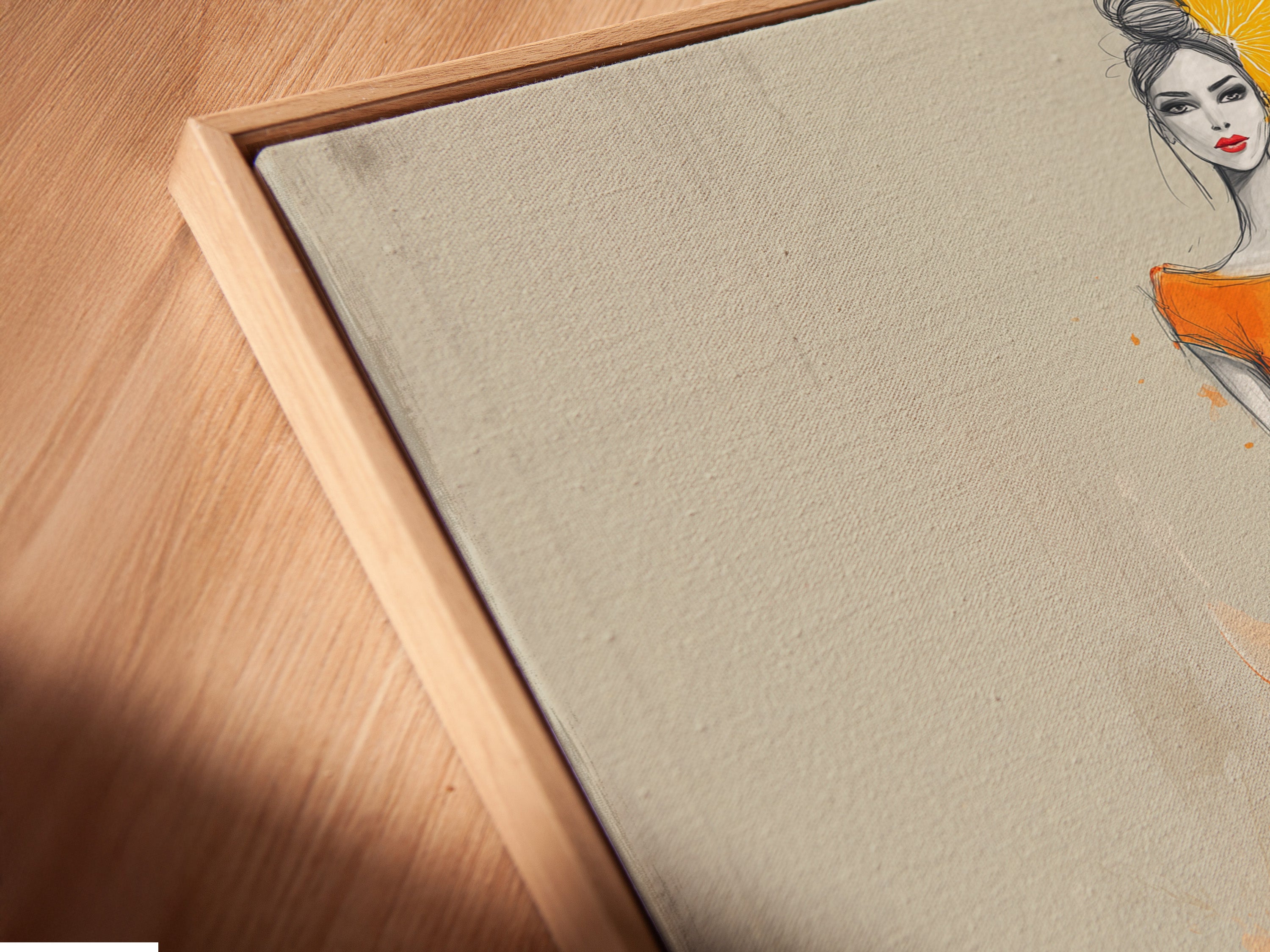 A close-up of a canvas print in a floating frame. The artwork features a chic woman in an orange dress. The stylish art print is perfect for modern decor. The floating frame adds a touch of elegance.
