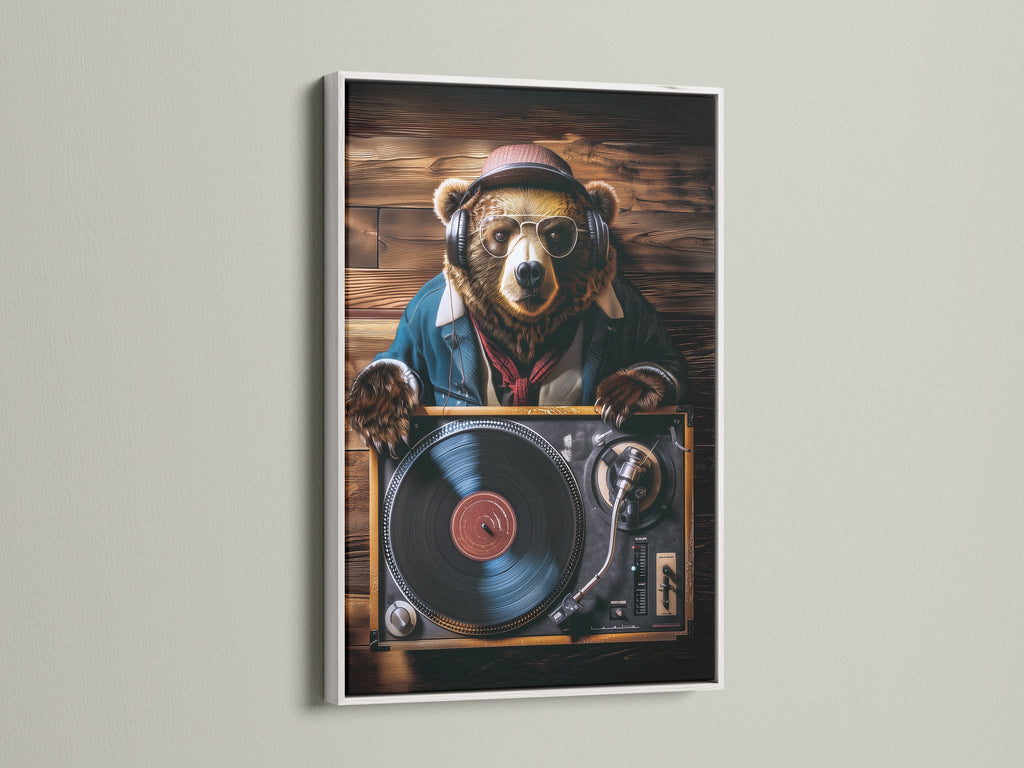 A white frame showcases a bear DJ art print. The artwork features a bear wearing headphones and sunglasses. The bear is set against a wooden background. The white frame adds a clean touch. Bring musical charm to your space with this unique piece.