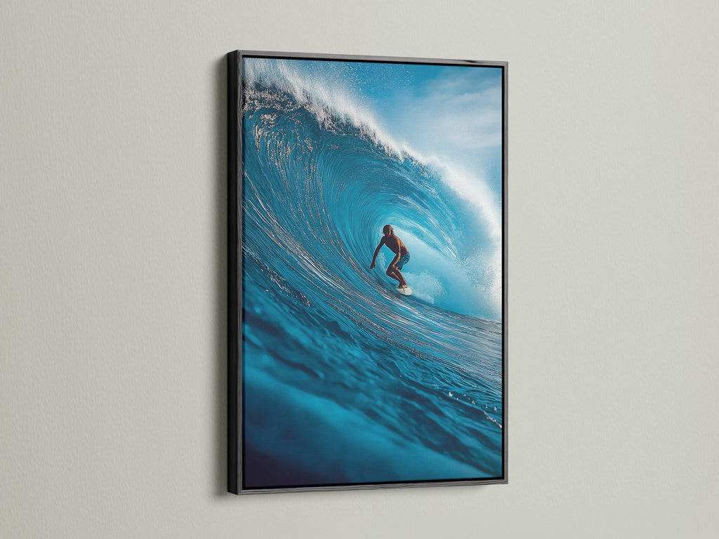 A surfer riding a wave is showcased in a black frame. The black frame adds a modern touch to the artwork. This framed art is a striking addition to any room. The black frame enhances the artwork.