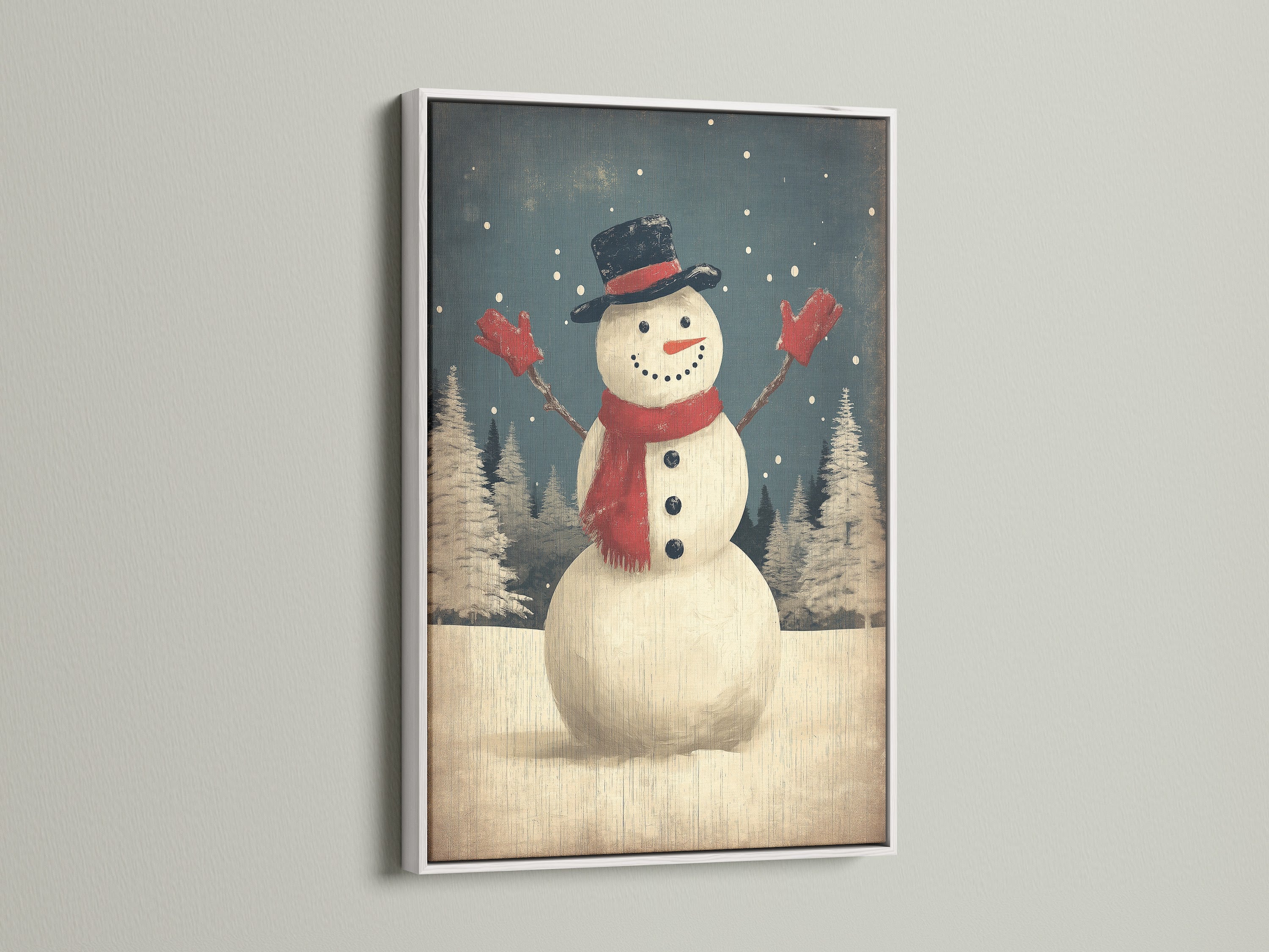 A cheerful snowman winter art print is showcased in a clean white frame. The artwork enhances the holiday home decor with its festive appeal. It is an ideal christmas canvas art for a bright and cozy setting.