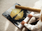 A woman is carefully rolling a fine art poster paper. The poster paper is of high quality and archival grade. Preserve your artwork with our premium fine art poster paper. The paper ensures vibrant colors and longevity.