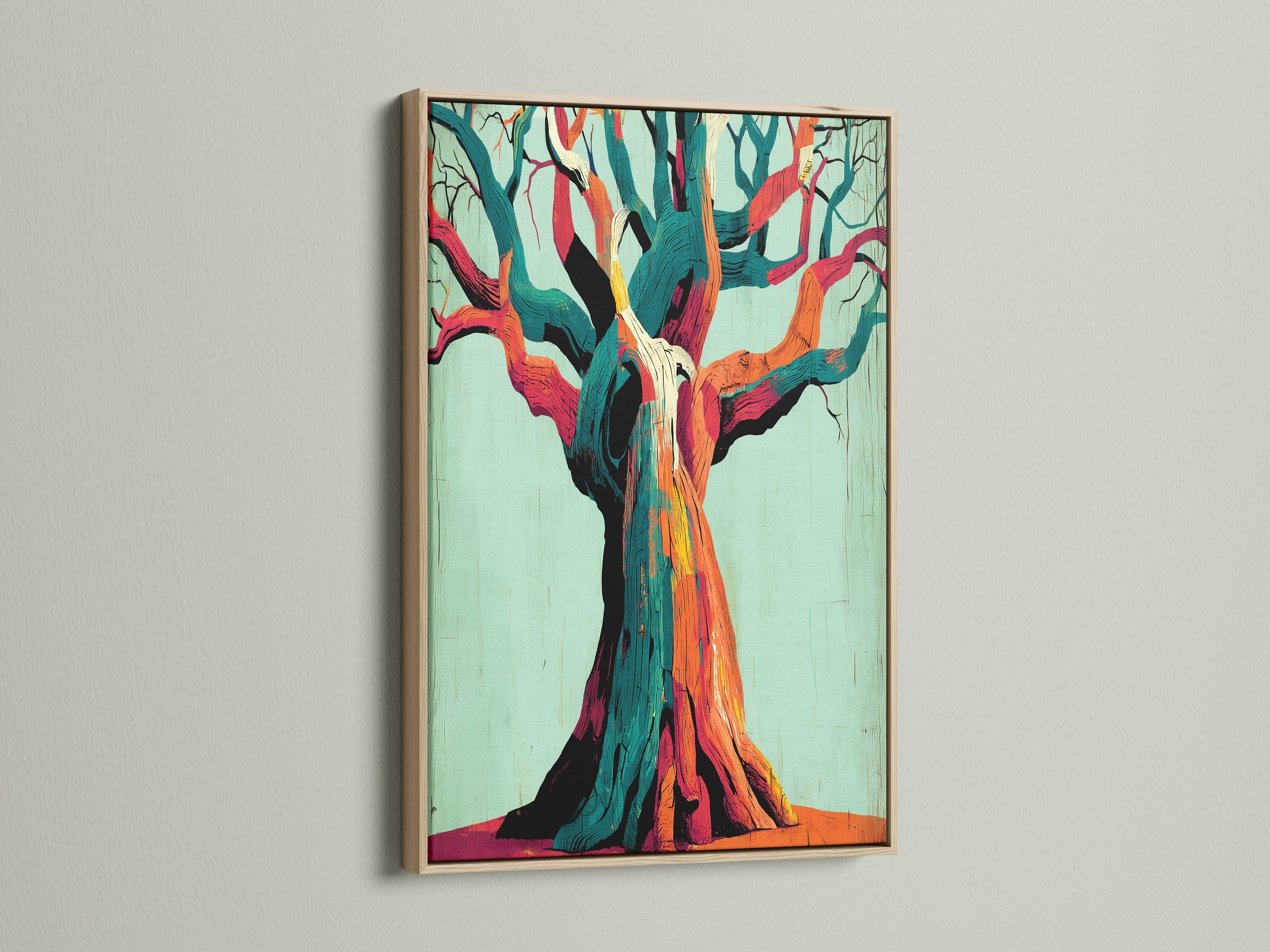 This is an Abstract Tree Canvas Print with an oak frame. The colorful artwork adds a vibrant touch to any space. It is perfect for modern home decor and nature-inspired aesthetics.