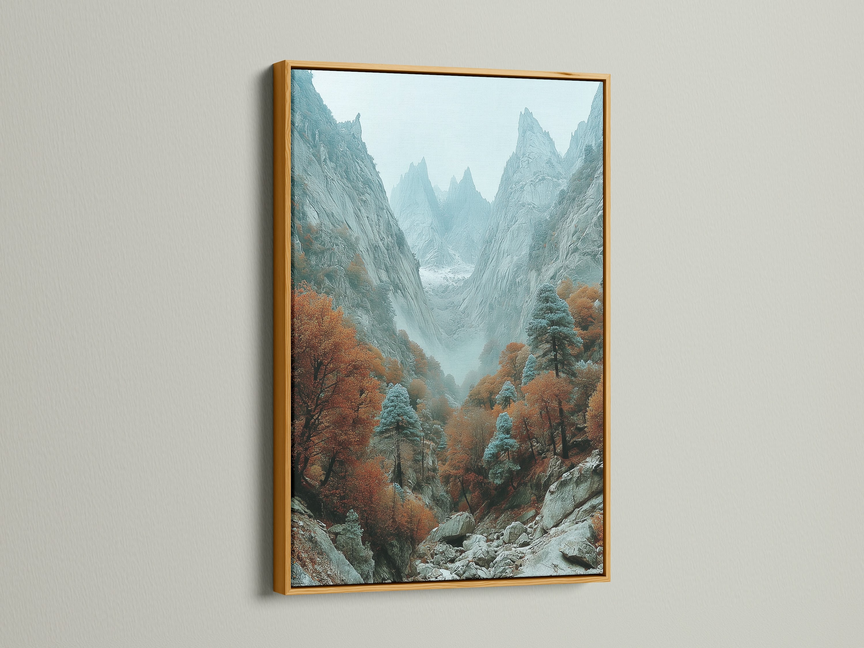 Autumn wall art featuring a mountain valley in a gold frame. This nature photography showcases a misty canyon landscape. Perfect for creating a cozy atmosphere in your cabin or vacation home. The gold frame adds elegance.