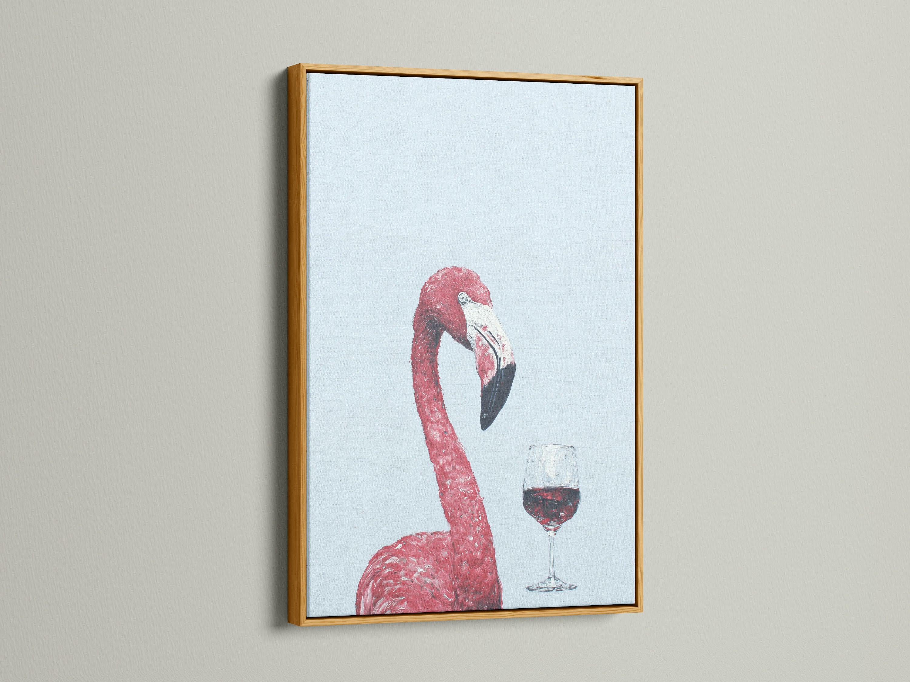 This pink flamingo art print is showcased in a gold frame. The wine art print brings a luxurious feel to your home bar. This tropical bird artwork is perfect for pink wall art.