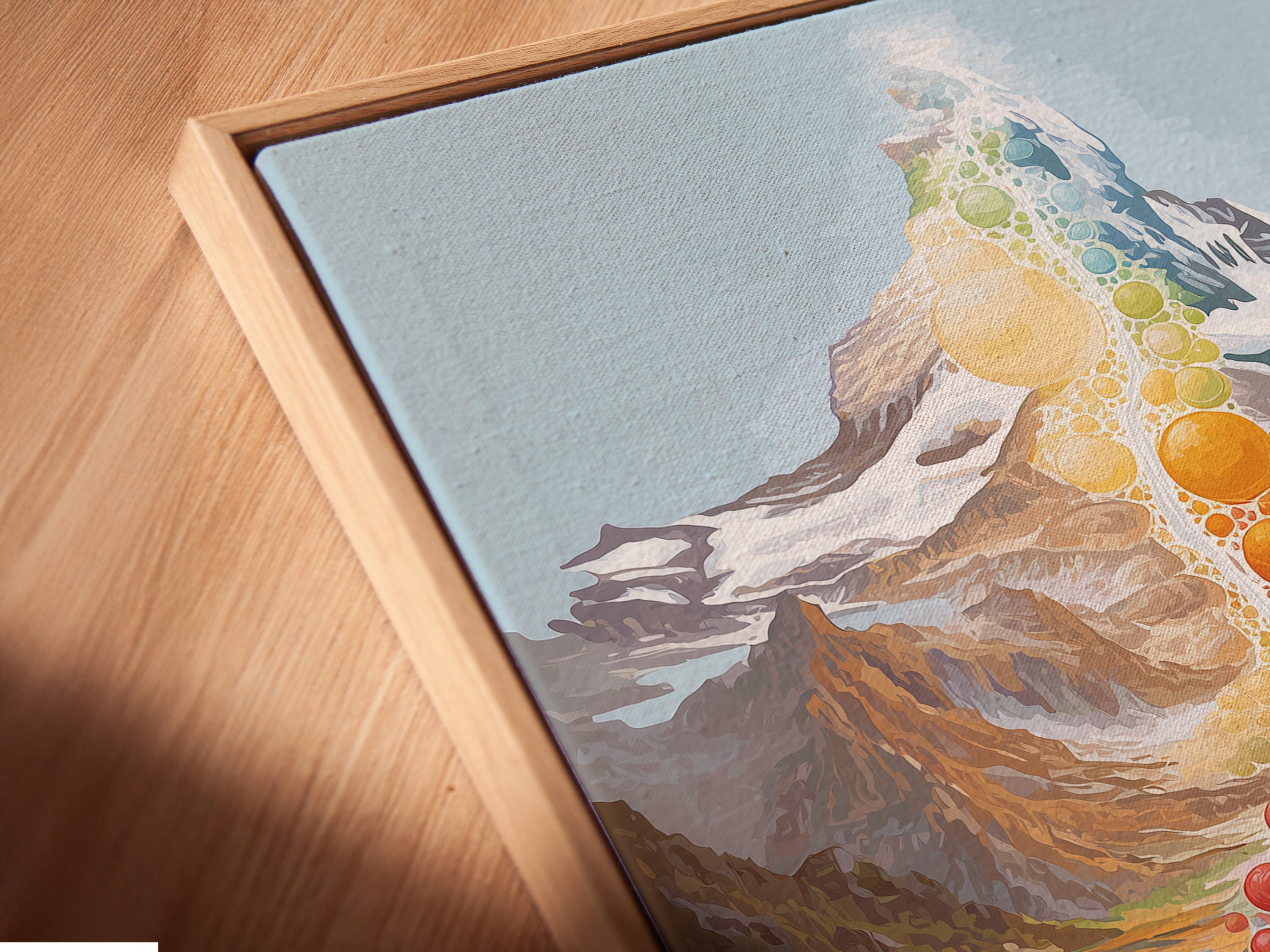 Close-up of a canvas print in a floating frame. This artwork shows a vibrant Chakra Mountain and waterfall. The floating frame gives the artwork a modern and sophisticated look. Perfect for adding a spiritual touch to your living room or meditation space. A unique piece.