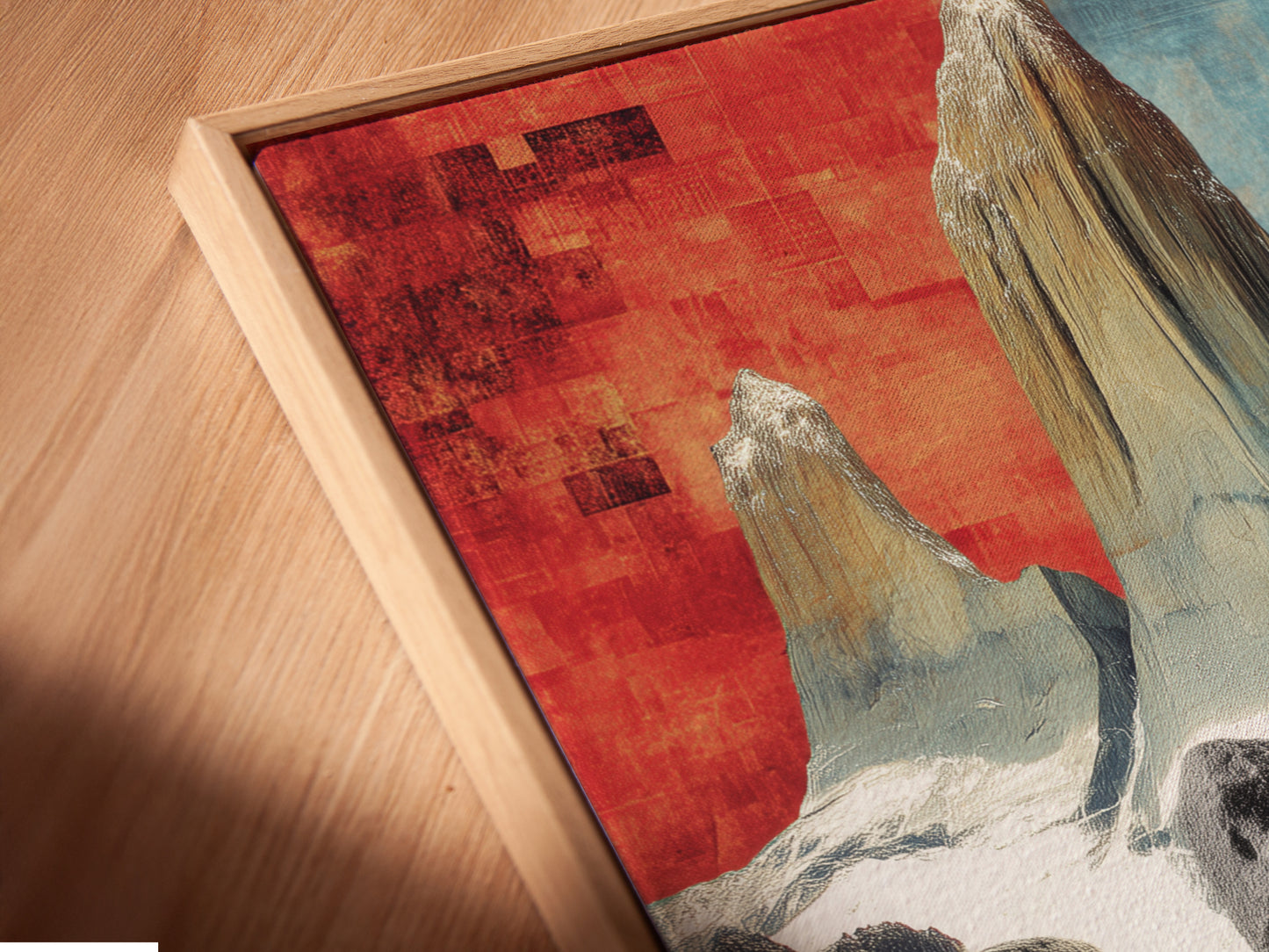Close-up angled view of a canvas print in a floating frame. The surreal stone figures art is beautifully displayed. The abstract landscape artwork enhances any interior. This modern art print is ready to hang.
