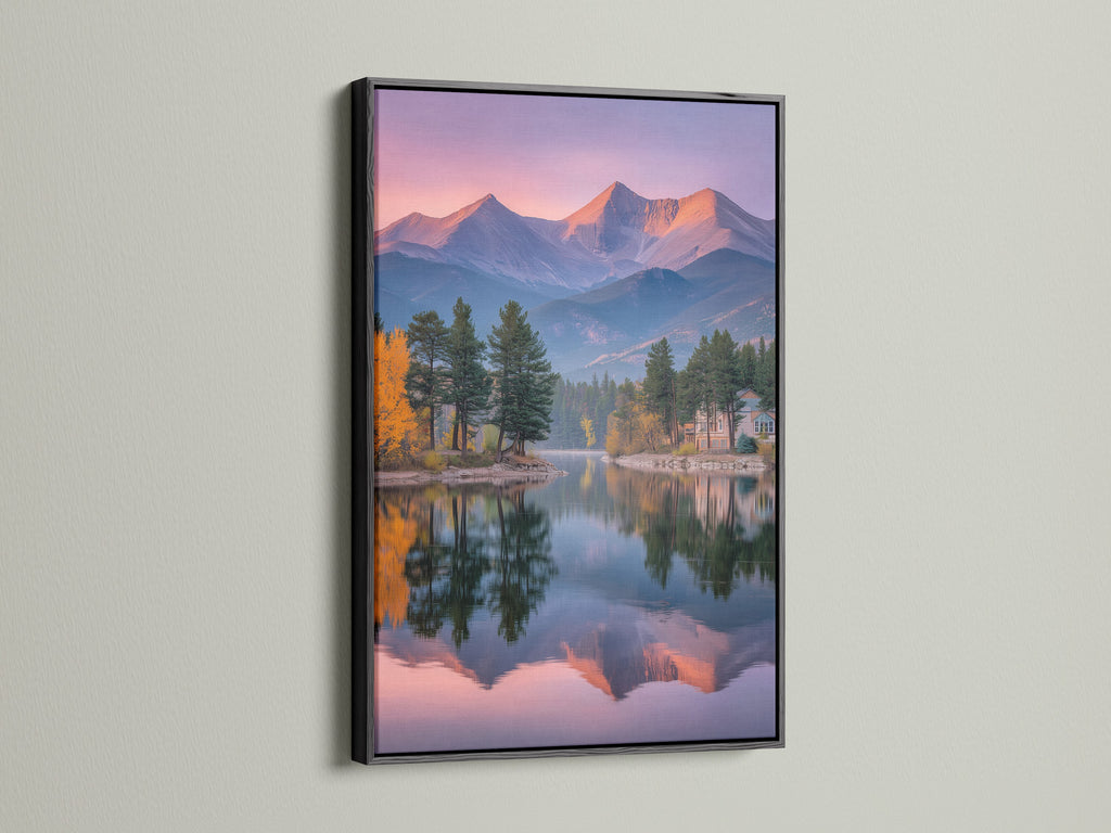 A black frame highlights this mountain lake canvas artwork. The landscape print features a stunning mountain reflection. This scenic artwork complements lodge style interiors. The black frame adds a touch of sophistication to the serene wall art.