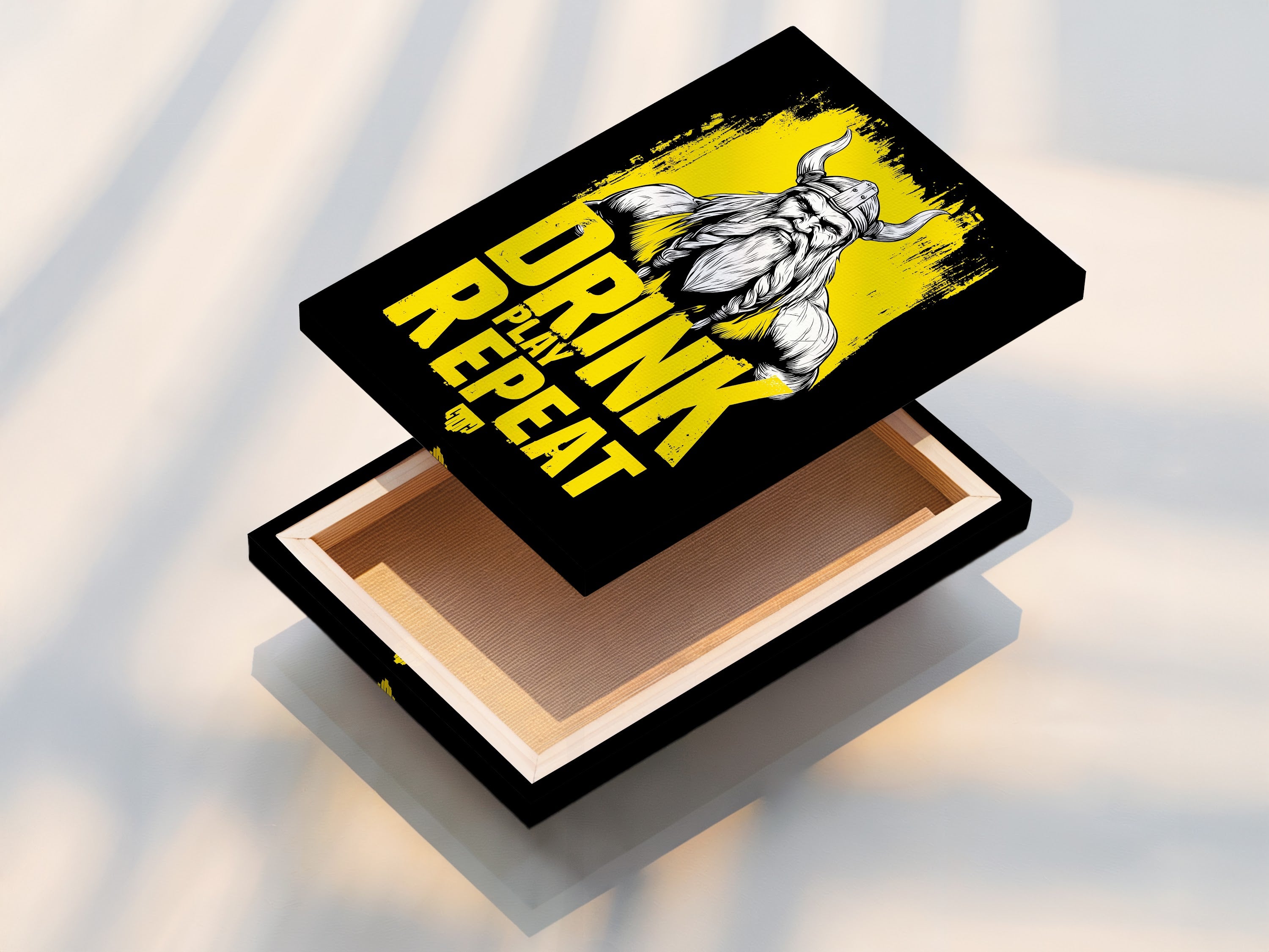 This image showcases a stretched canvas print of the Viking Warrior. This Nordic mythology art is perfect for man cave decor. The stretched canvas offers a gallery-ready look. It highlights the Drink Play Repeat artwork. This print is a must-have for any gaming or gym space.