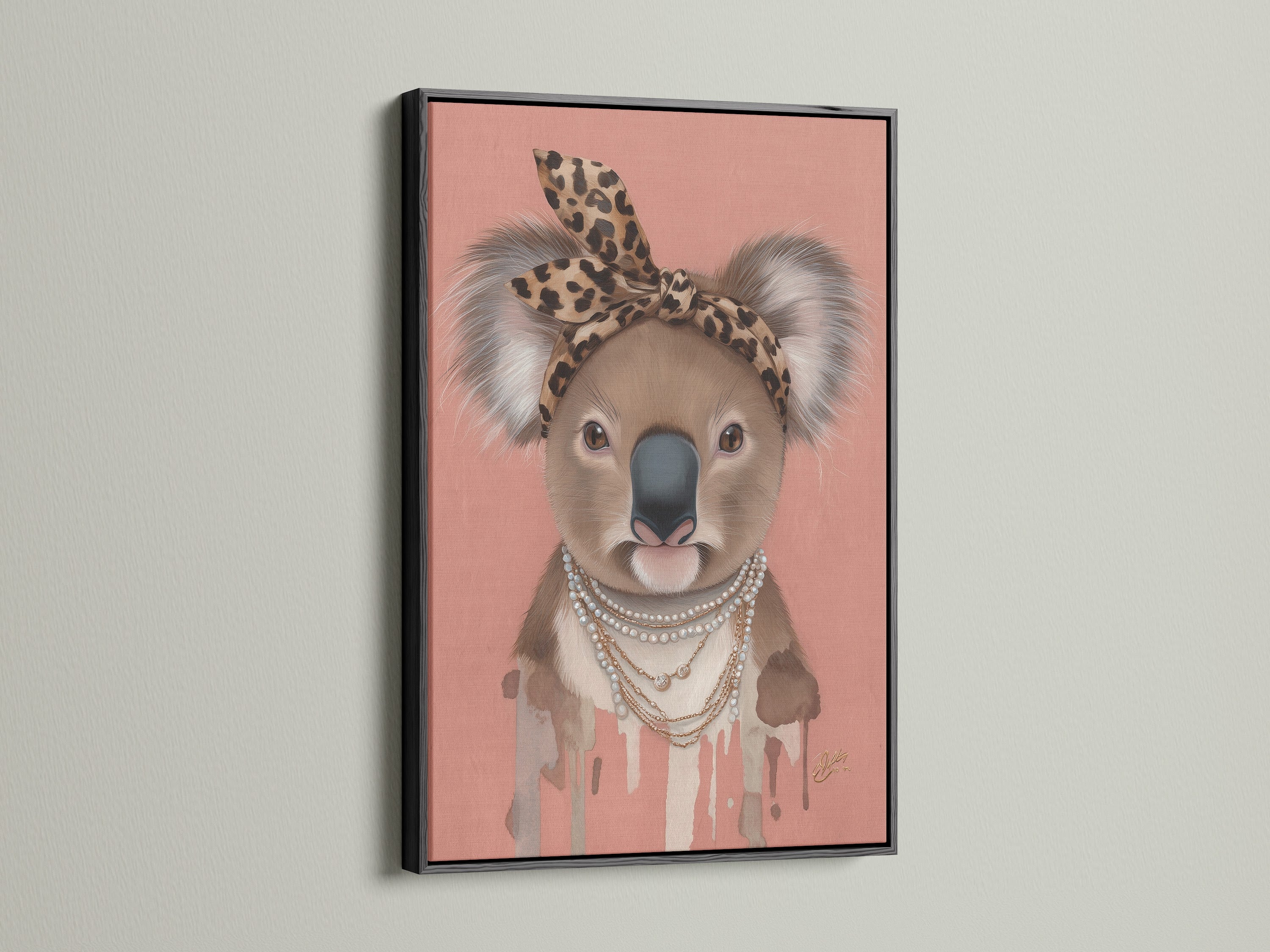 Black Frame highlights the Koala Wall Art. This trendy animal canvas print suits nurseries and kids' rooms. The Koala is adorned with a leopard print headband and pearl necklace. A stylish piece of modern animal art.